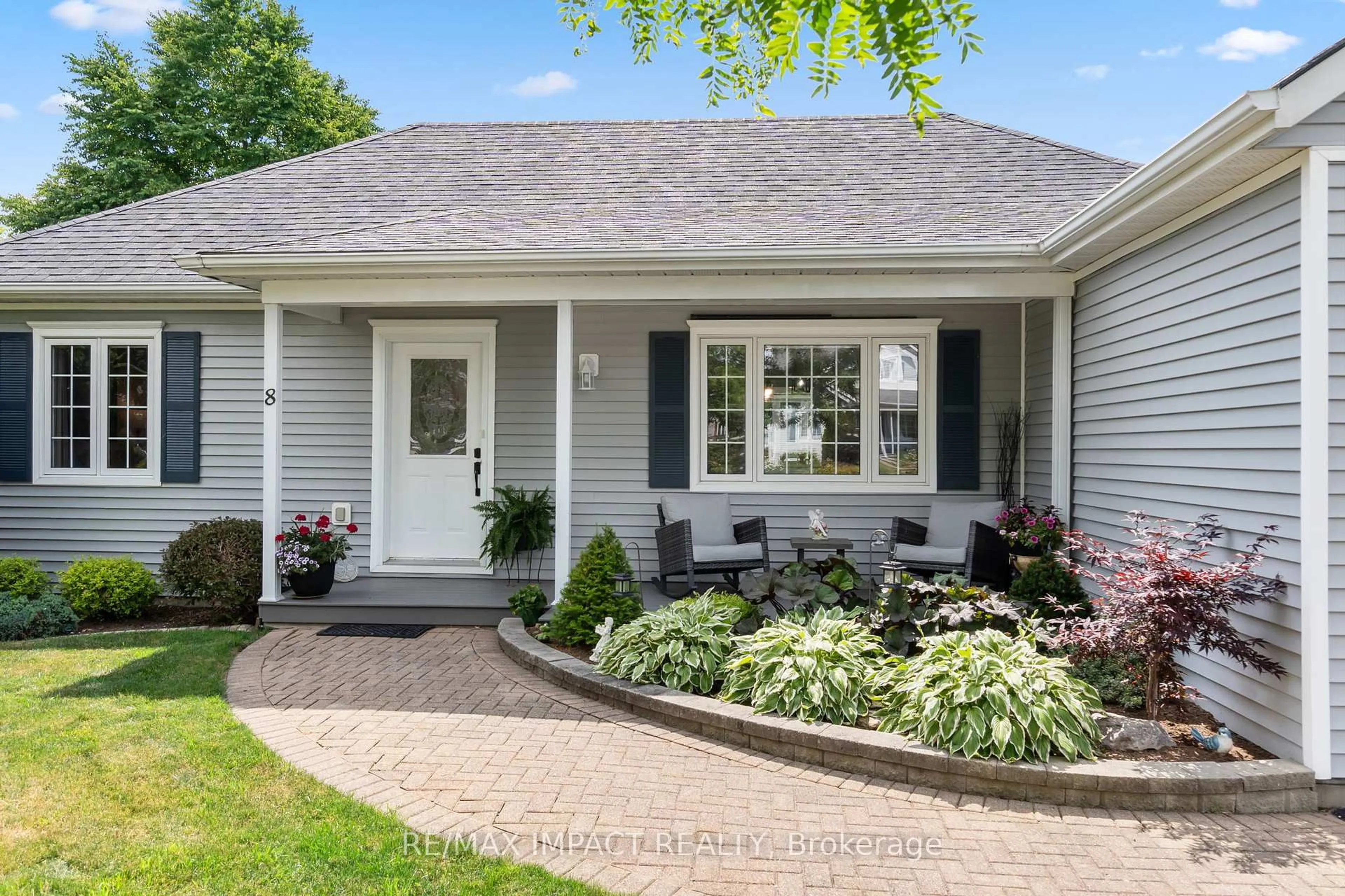 Home with vinyl exterior material, street for 8 Lockwood Dr, Brighton Ontario K0K 1H0