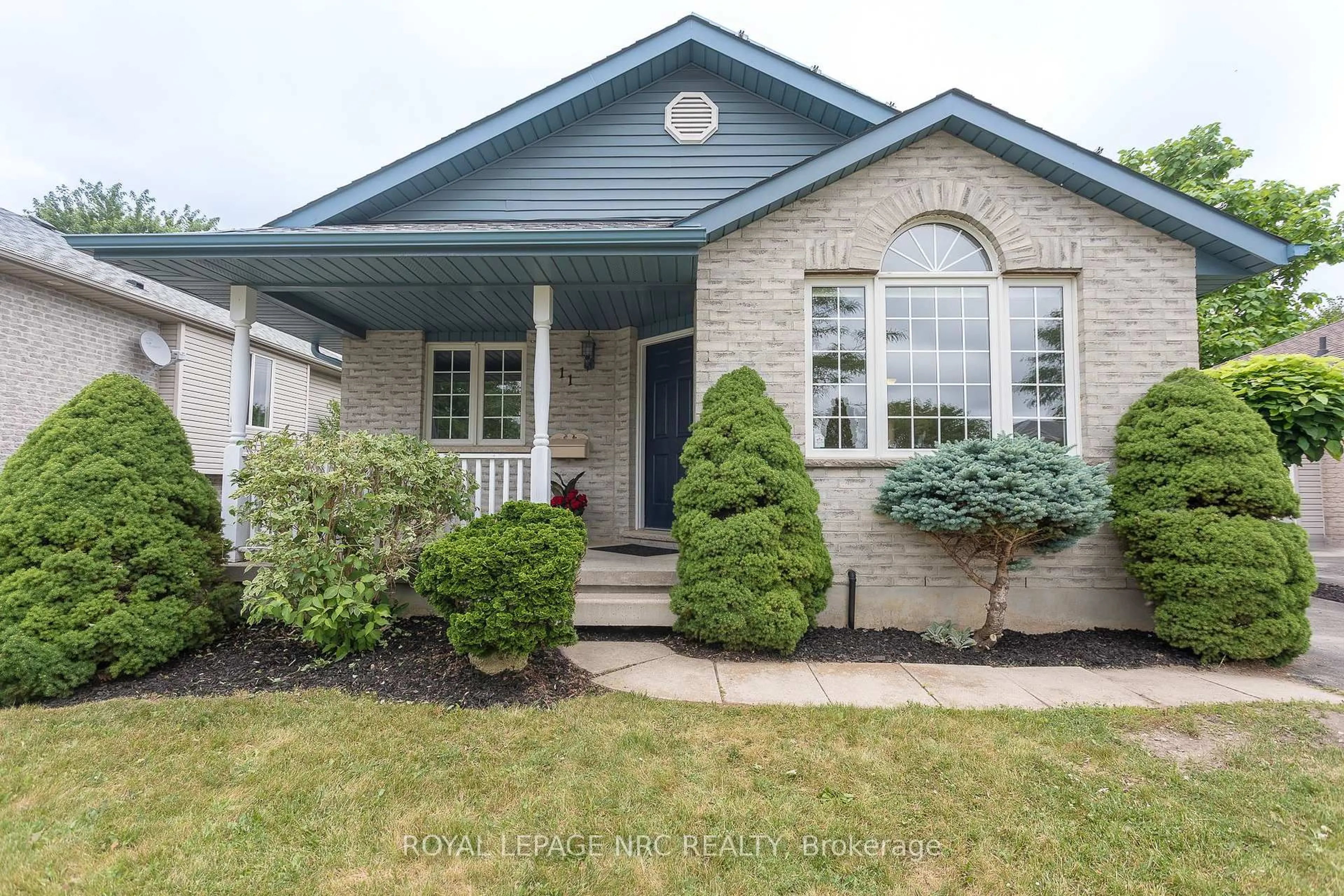 Home with vinyl exterior material, street for 11 Goldenrod Crt, St. Thomas Ontario N5P 4M7