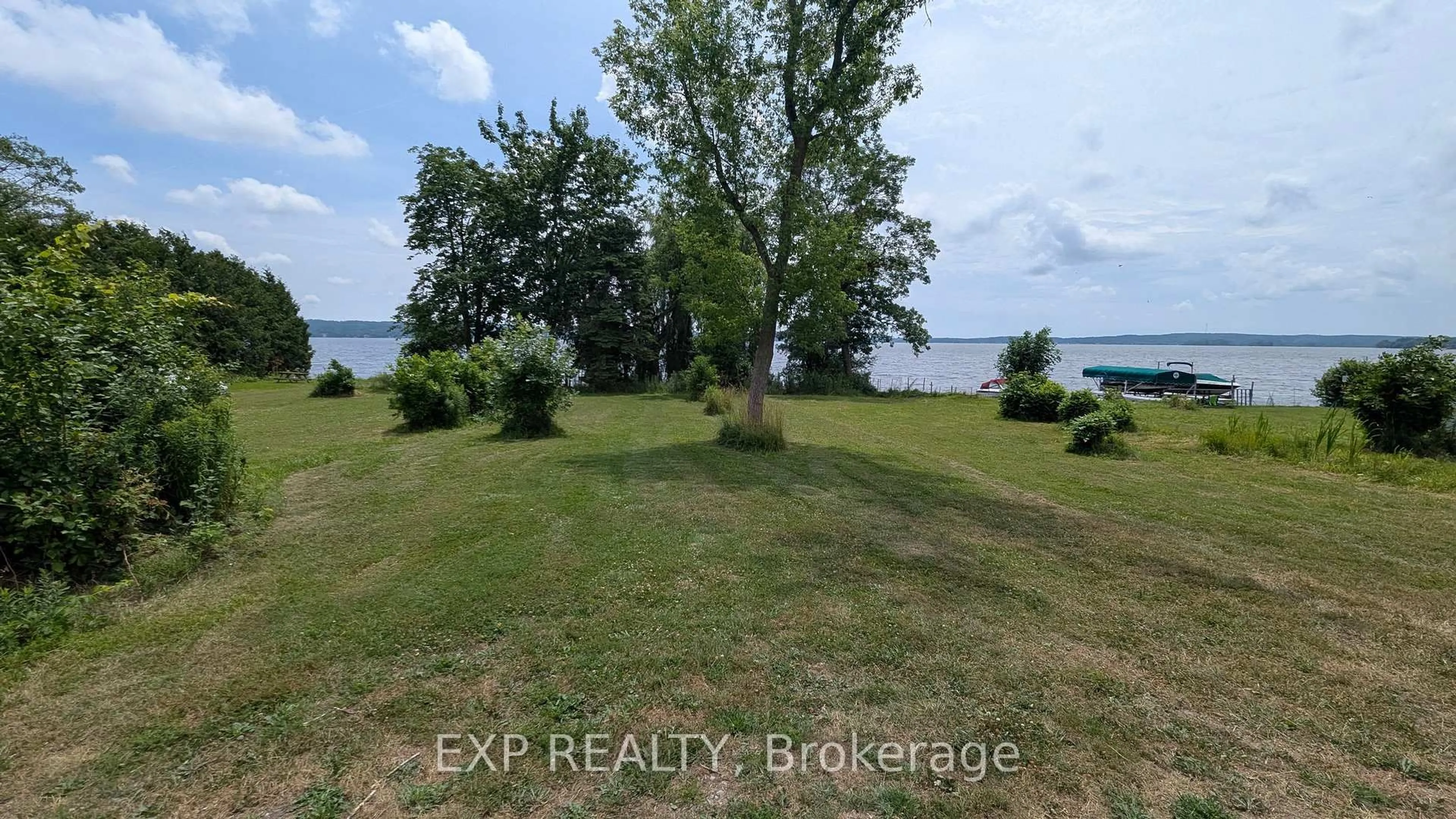 A pic from outside/outdoor area/front of a property/back of a property/a pic from drone, water/lake/river/ocean view for 556 North Shore Dr, Otonabee-South Monaghan Ontario K0L 1B0