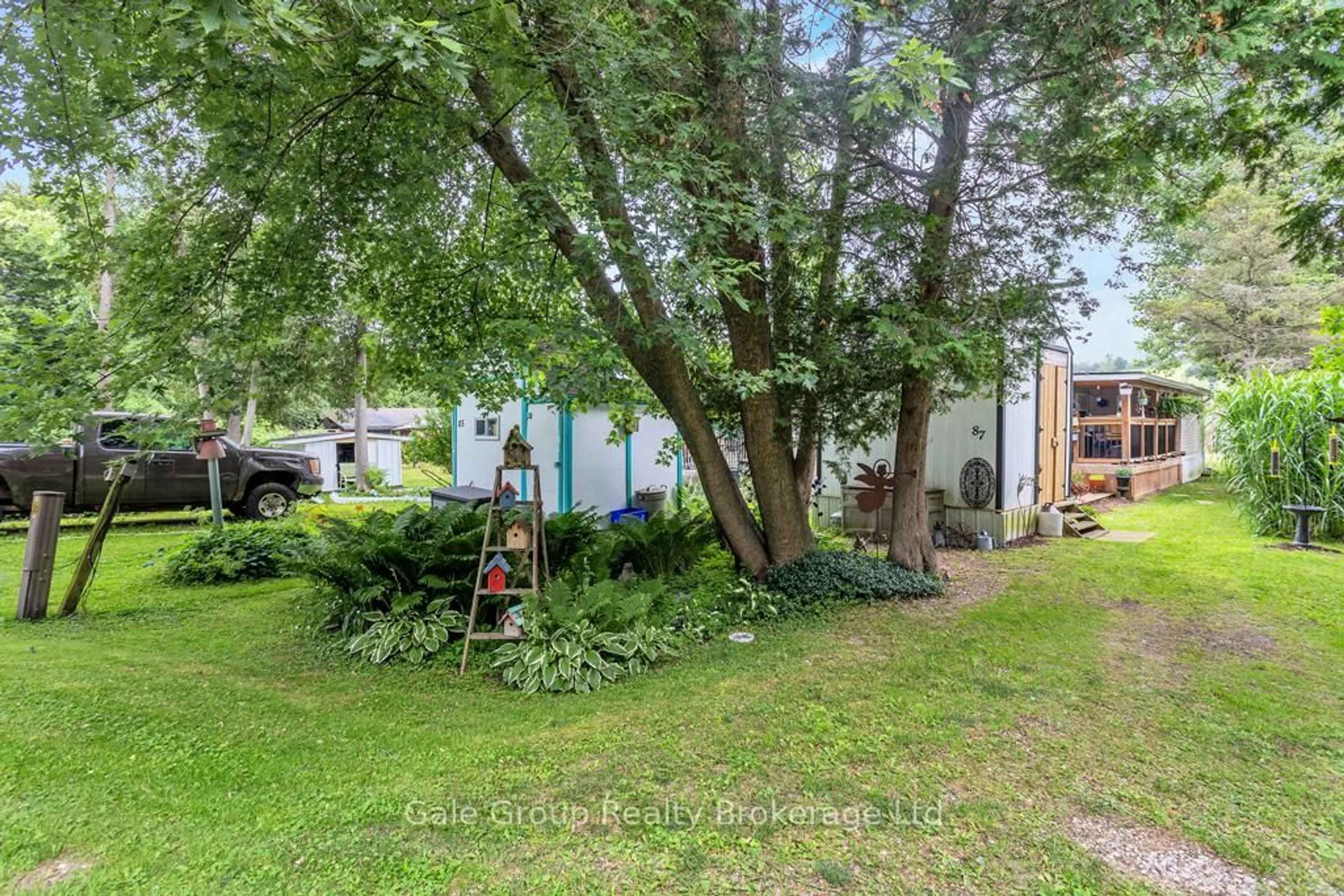 A pic from outside/outdoor area/front of a property/back of a property/a pic from drone, street for 495856 10th Line #Unit 87, East Zorra-Tavistock Ontario N4S 7V7
