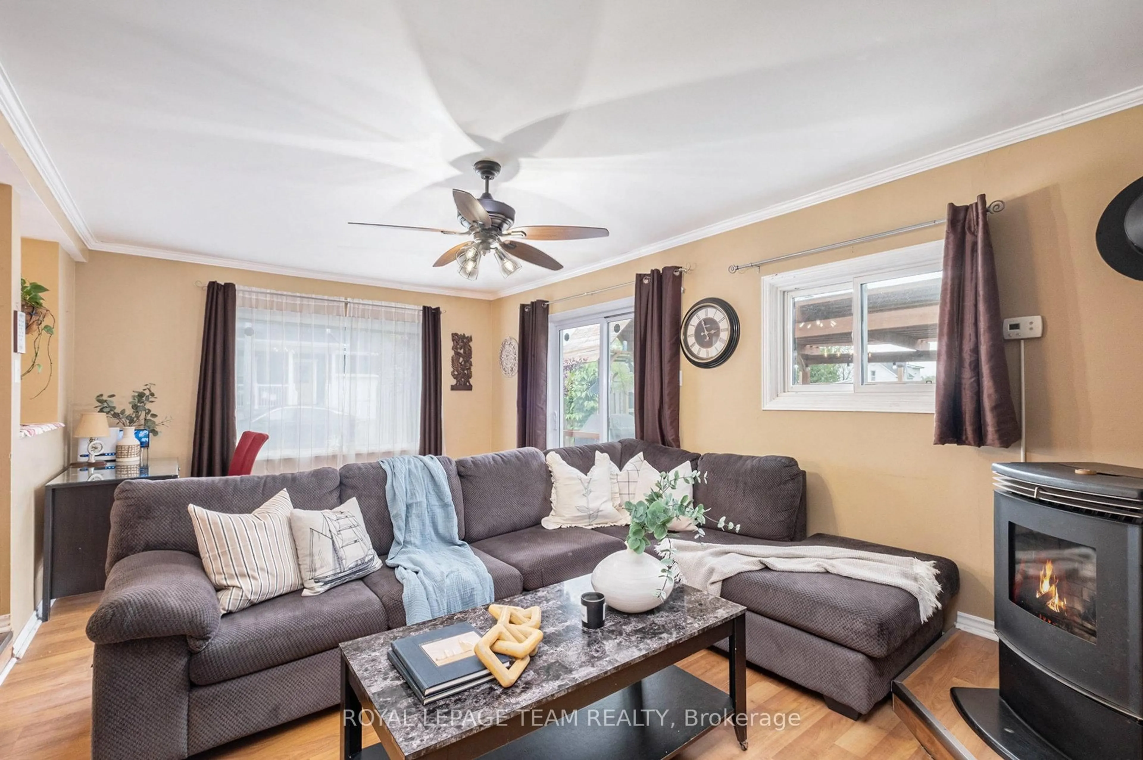 Living room with furniture, wood/laminate floor for 211 Drummond St, Merrickville-Wolford Ontario K0G 1N0