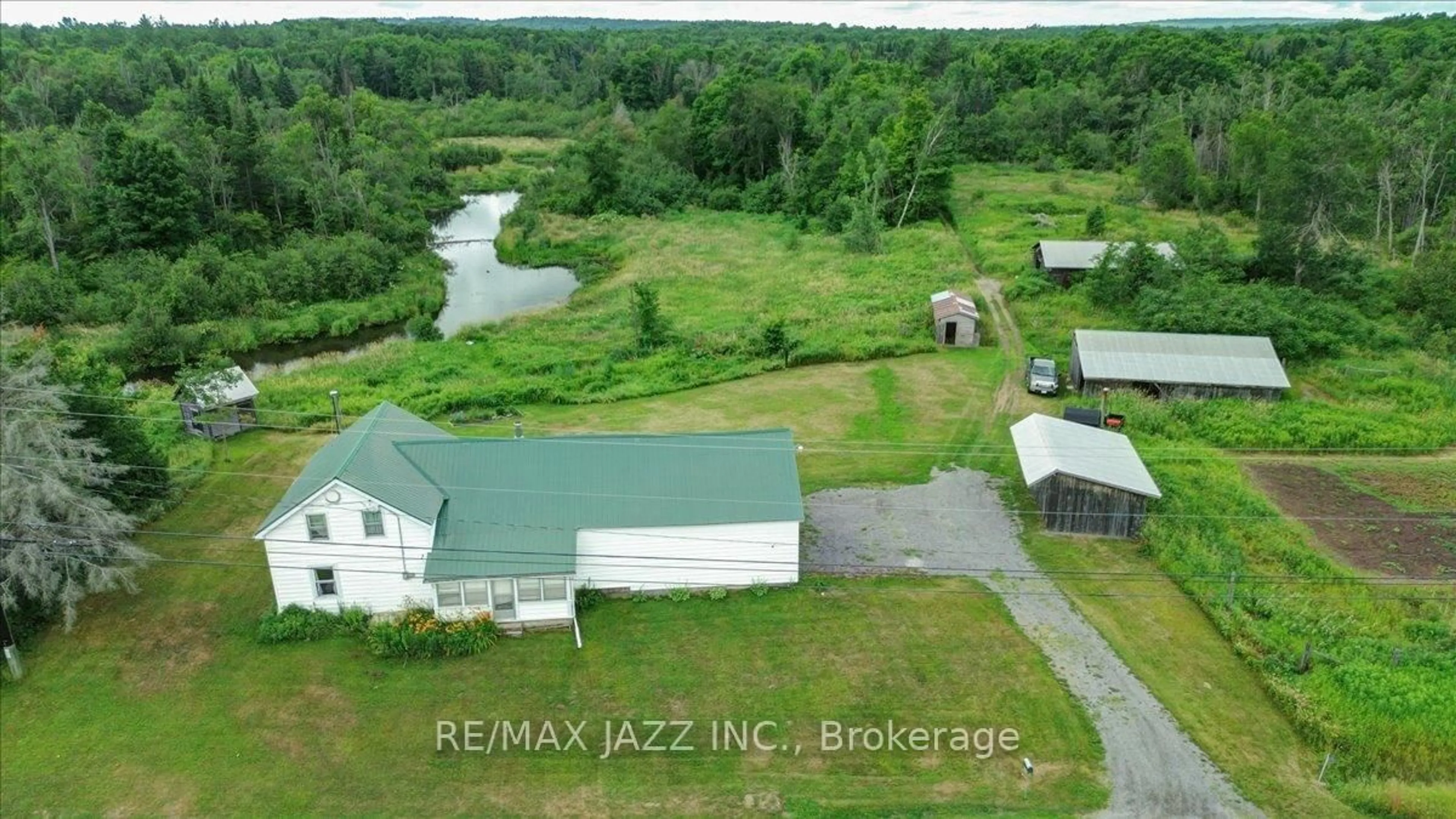 A pic from outside/outdoor area/front of a property/back of a property/a pic from drone, water/lake/river/ocean view for 16983 Highway 62, Madoc Ontario K0K 1Y0