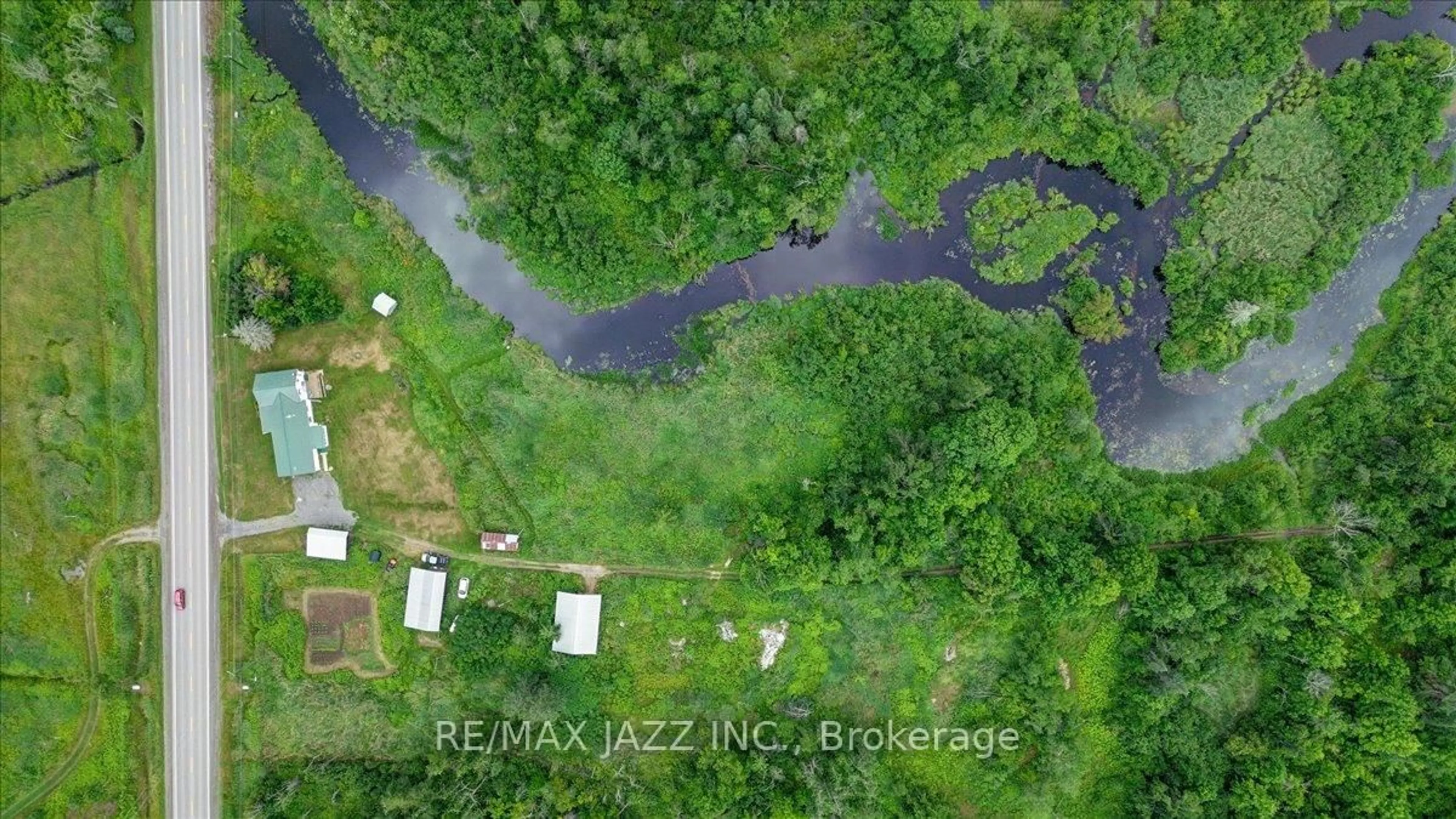 A pic from outside/outdoor area/front of a property/back of a property/a pic from drone, water/lake/river/ocean view for 16983 Highway 62, Madoc Ontario K0K 1Y0