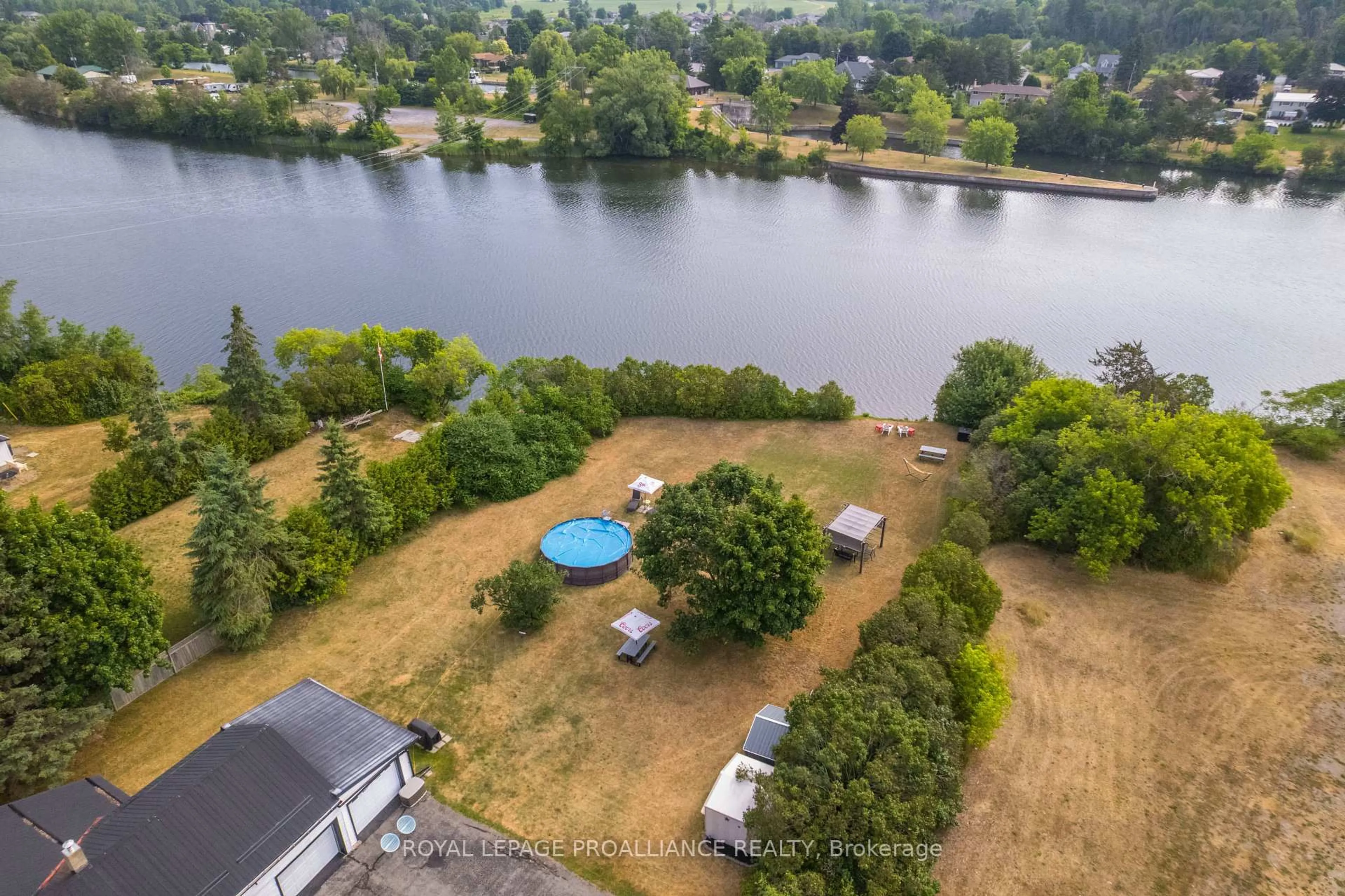 A pic from outside/outdoor area/front of a property/back of a property/a pic from drone, water/lake/river/ocean view for 113 South Trent St, Hastings Ontario K0K 2C0