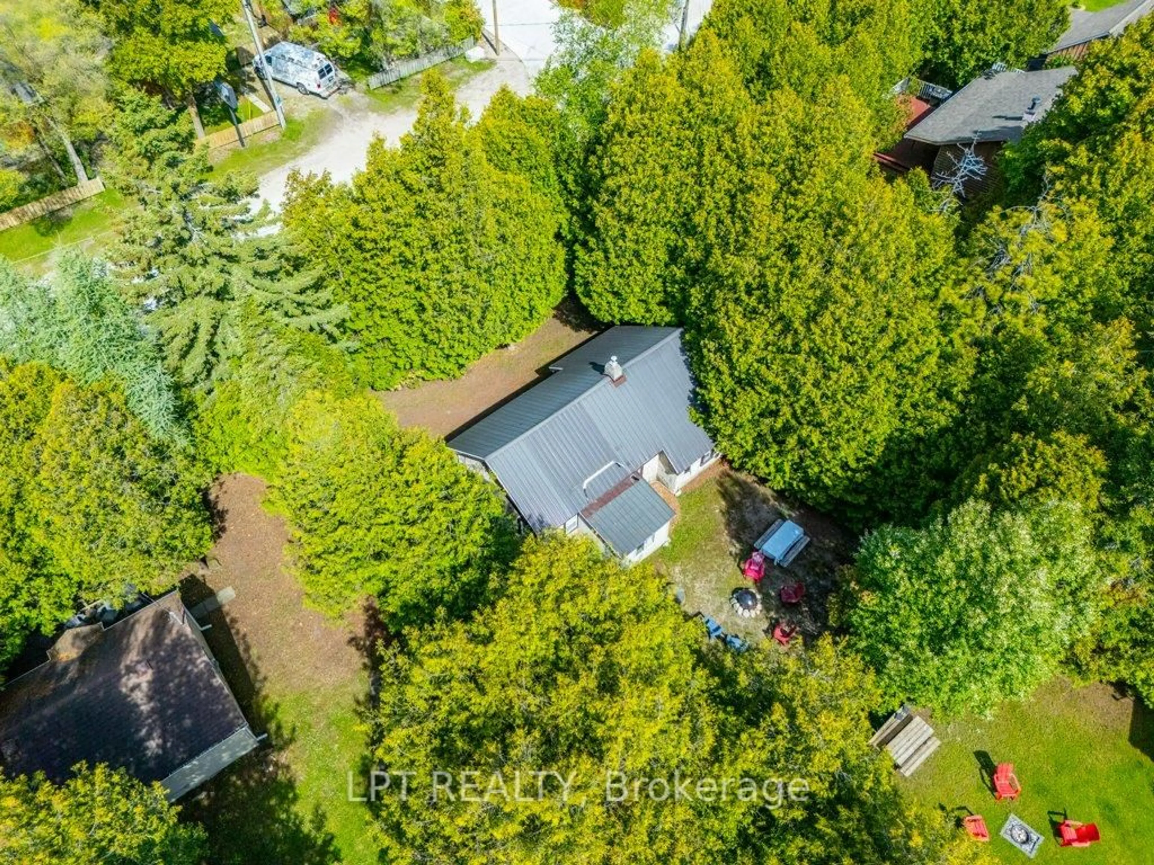 A pic from outside/outdoor area/front of a property/back of a property/a pic from drone, forest/trees view for 117 Second Ave, South Bruce Peninsula Ontario N0H 2G0