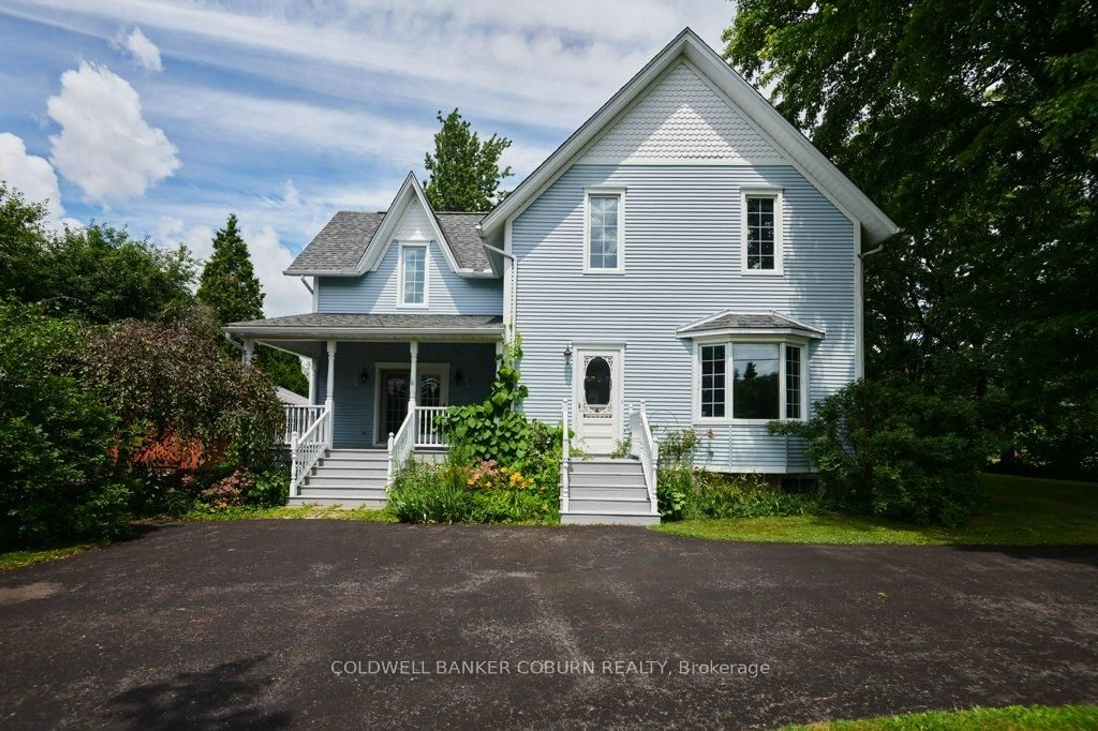 A pic from outside/outdoor area/front of a property/back of a property/a pic from drone, street for 11719 Lakeshore Dr, South Dundas Ontario K0C 1X0