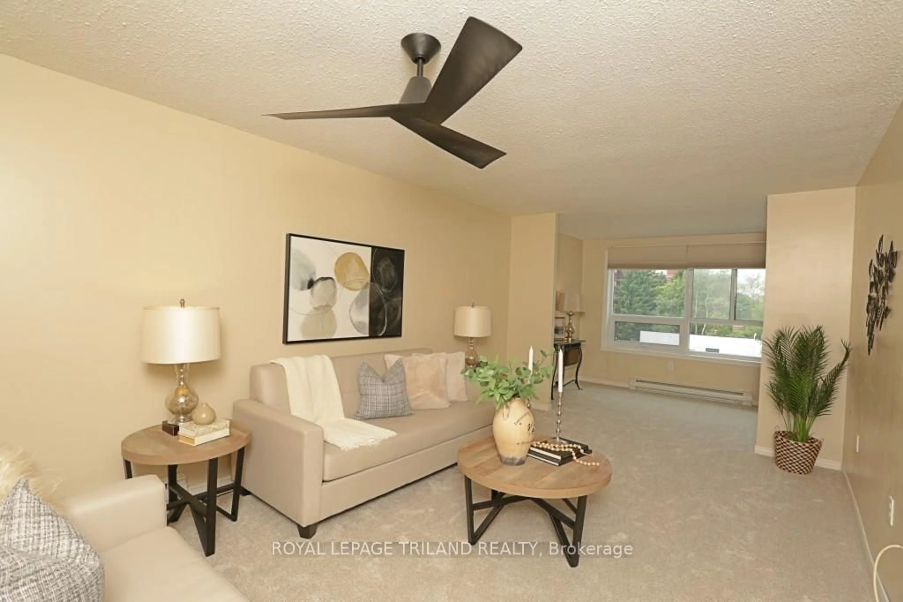 Living room with furniture, unknown for 95 Baseline Rd #309, London South Ontario N6J 4X3