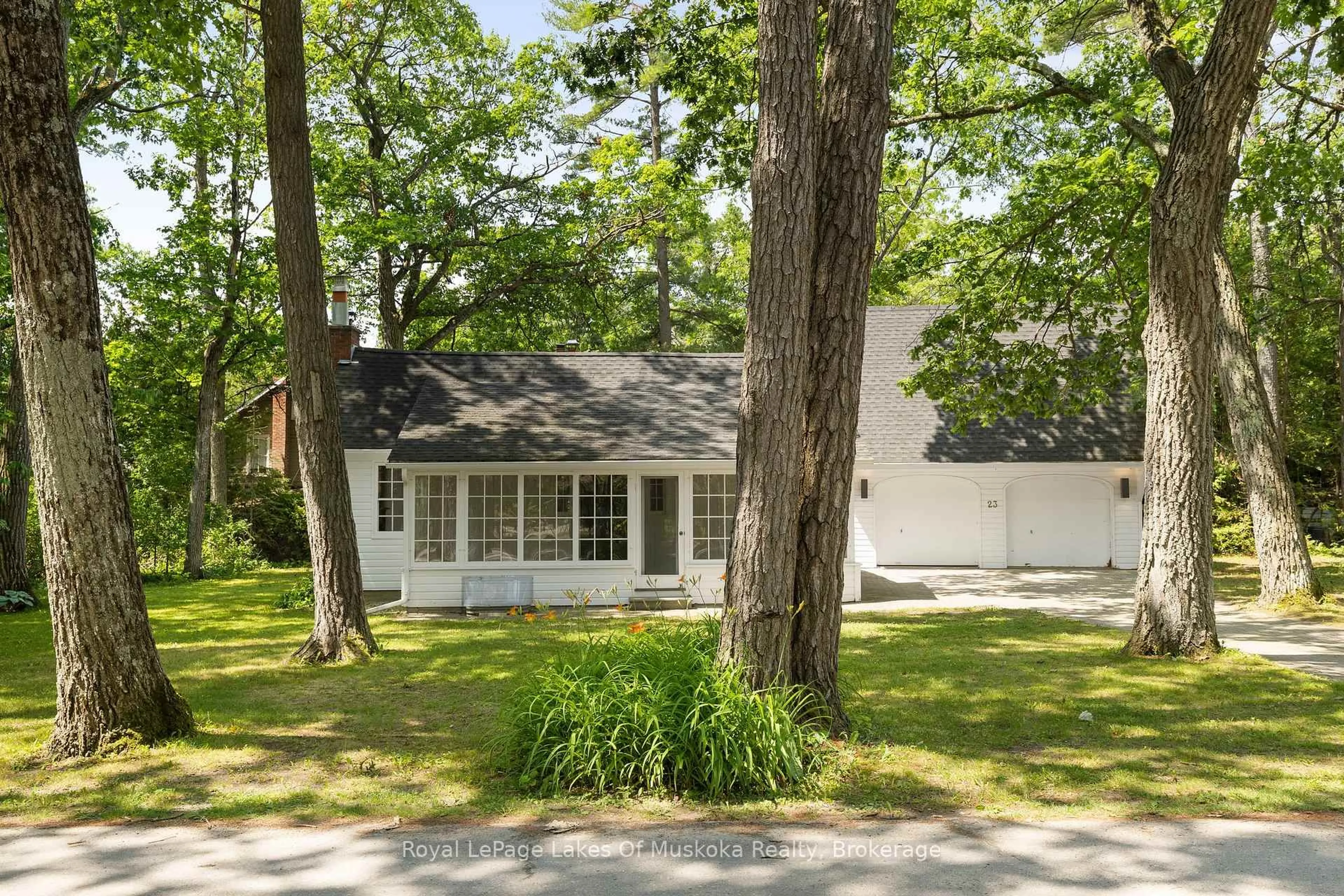 Home with vinyl exterior material, street for 23 First St, Kawartha Lakes Ontario K0M 1N0