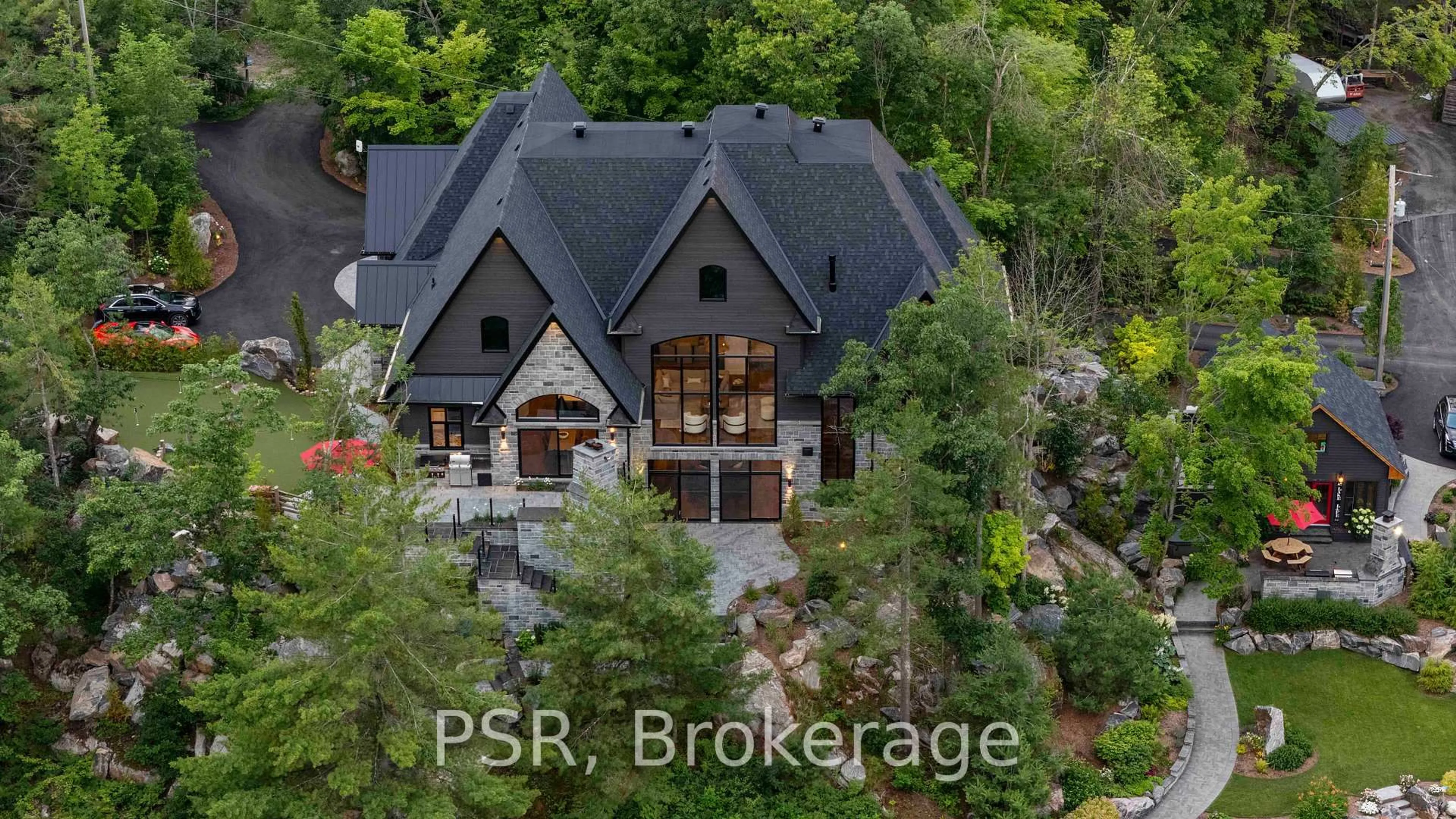 A pic from outside/outdoor area/front of a property/back of a property/a pic from drone, unknown for 1031 Road 2900, Gravenhurst Ontario P1P 1R2