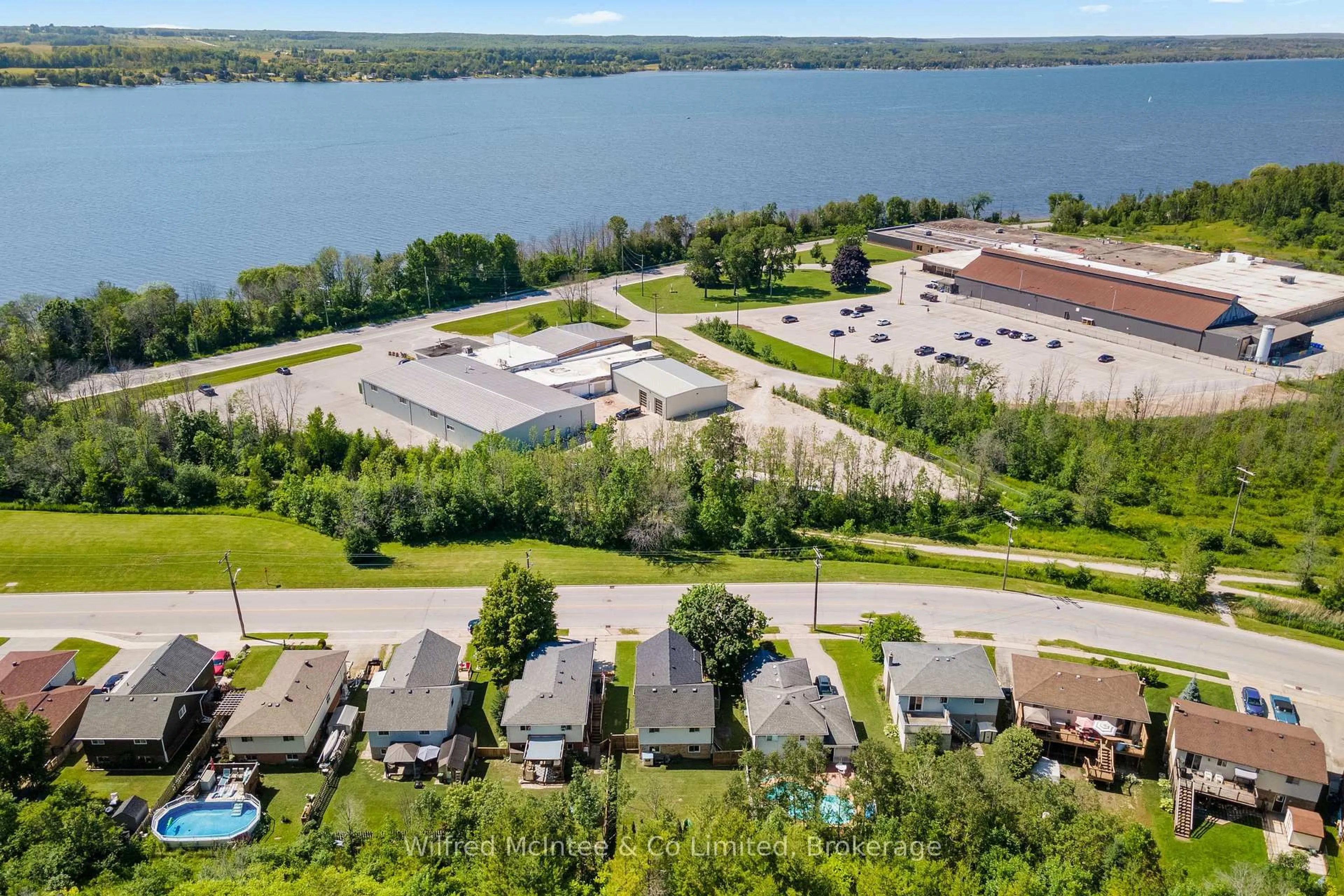 A pic from outside/outdoor area/front of a property/back of a property/a pic from drone, water/lake/river/ocean view for 2725 3rd Ave, Owen Sound Ontario N4K 2M5