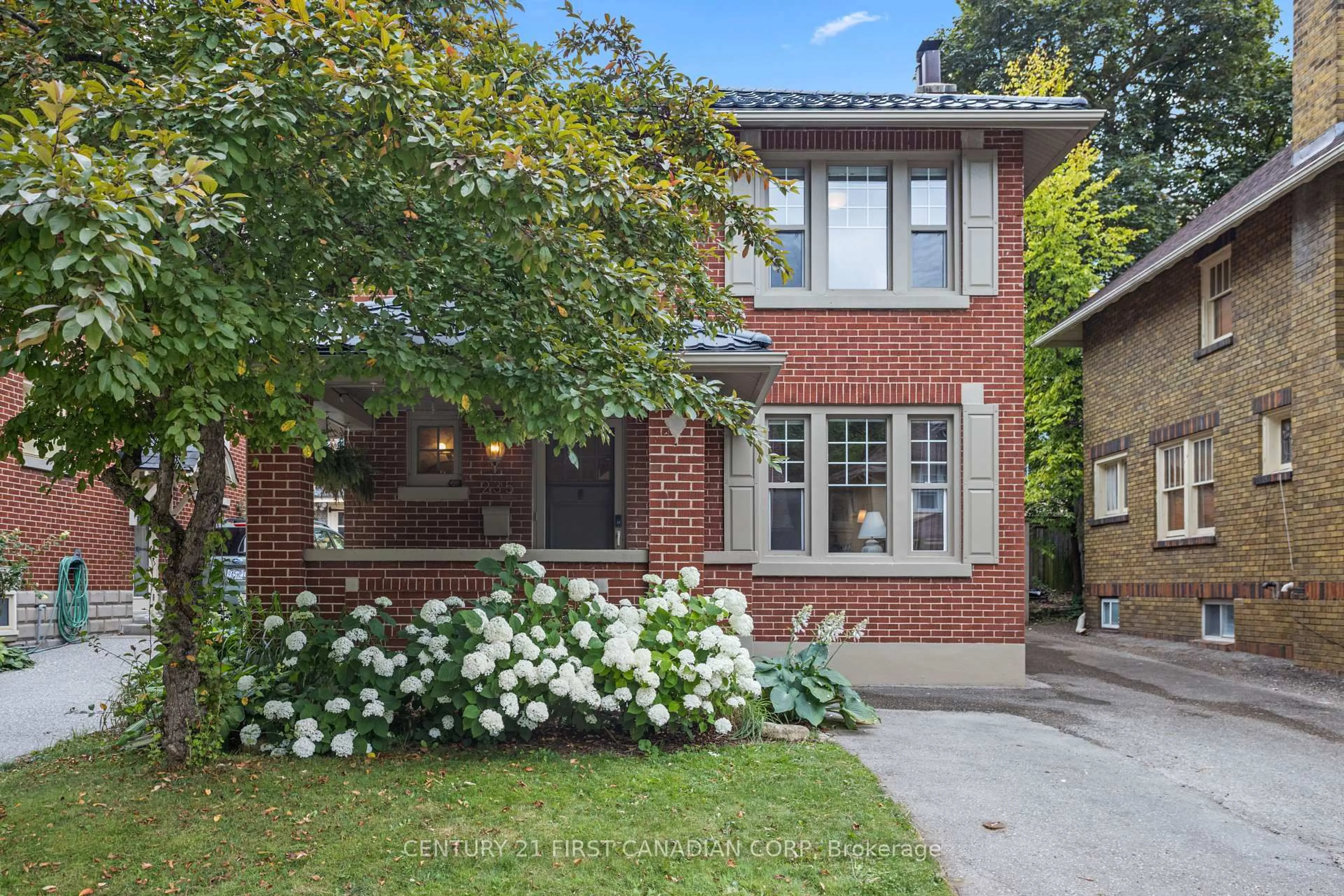 Home with brick exterior material, street for 235 Sherwood Ave, London East Ontario N6A 2G1