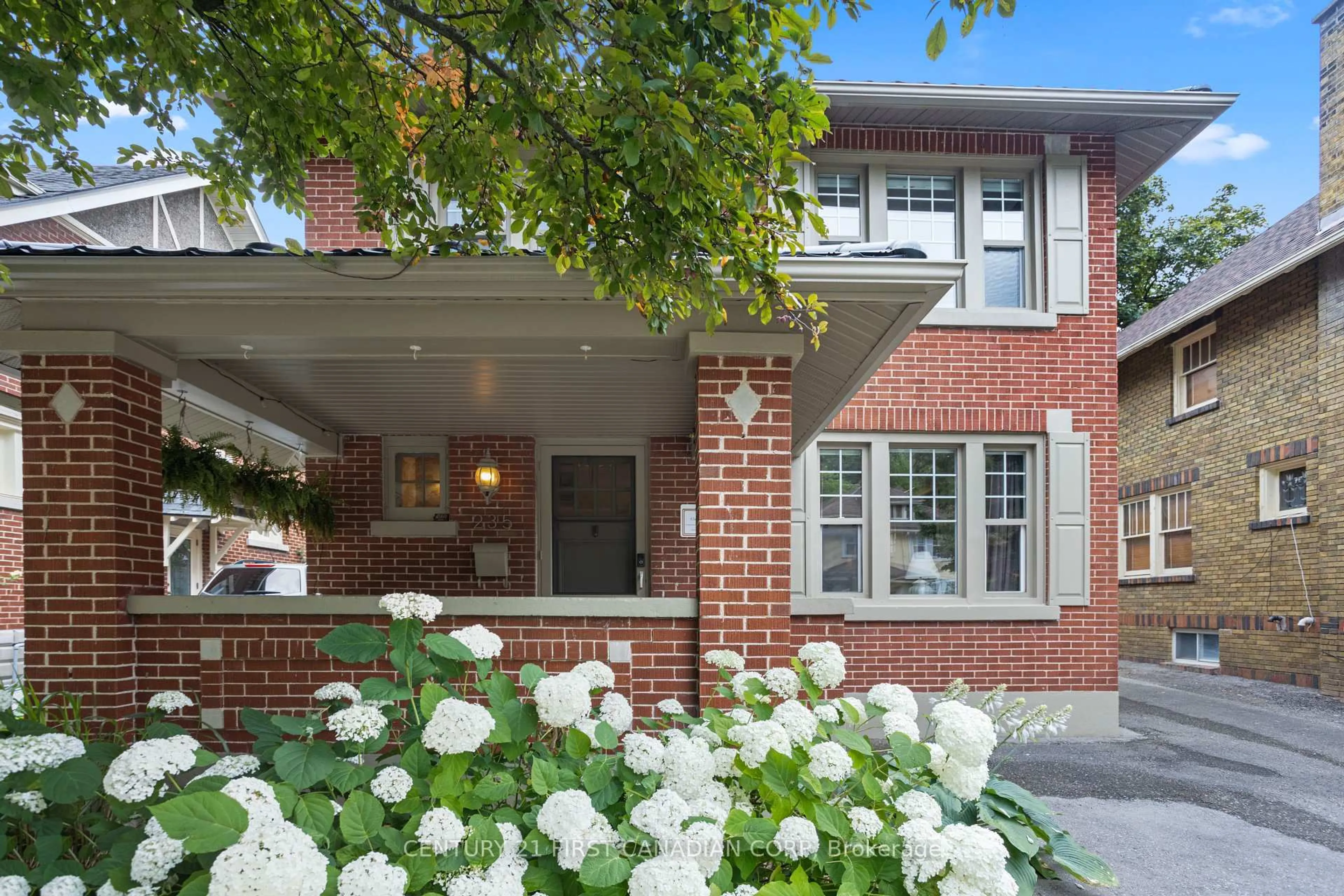Home with brick exterior material, street for 235 Sherwood Ave, London East Ontario N6A 2G1