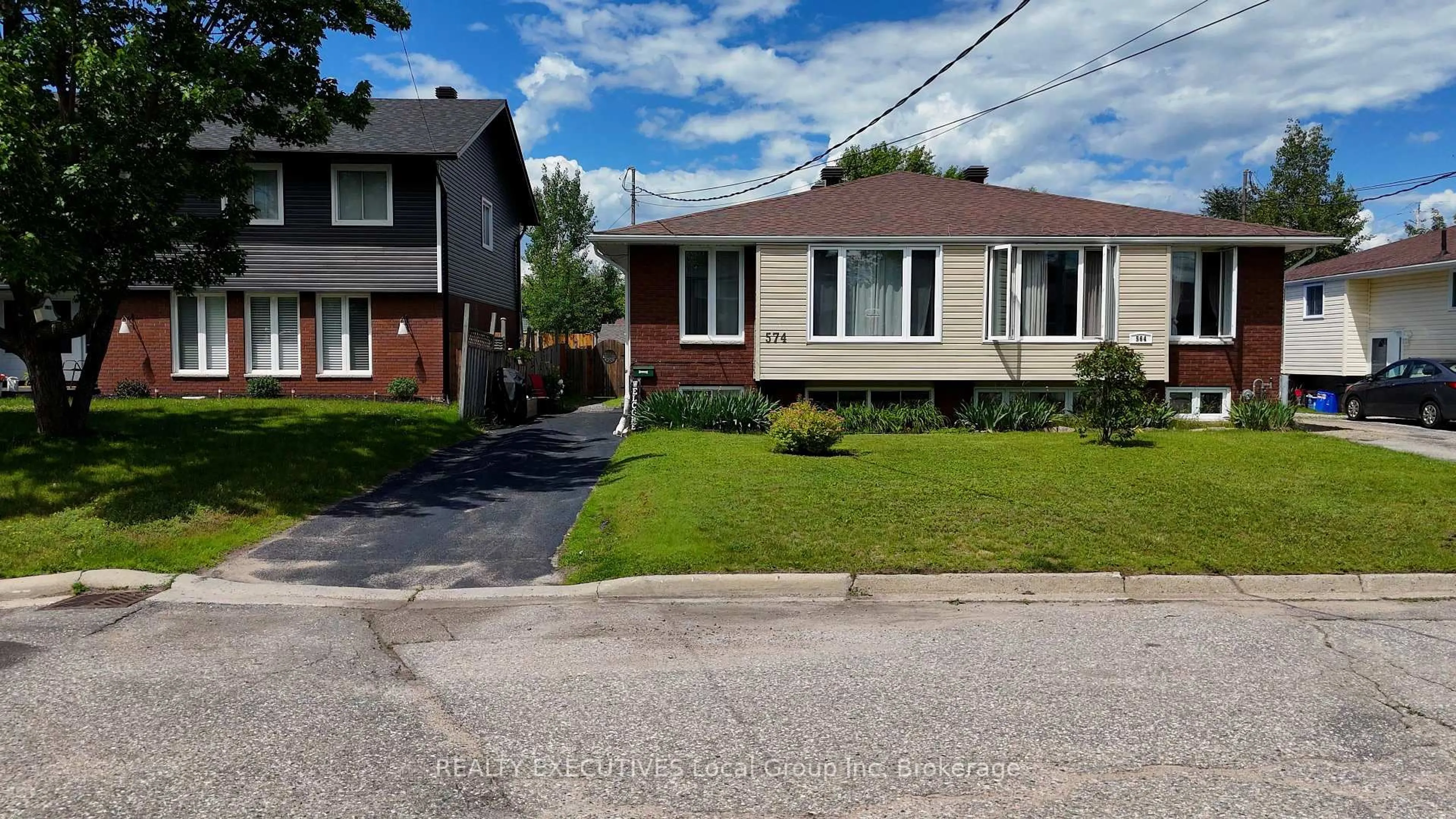 Home with brick exterior material, street for 574 Elmwood Ave, North Bay Ontario P1B 8R7