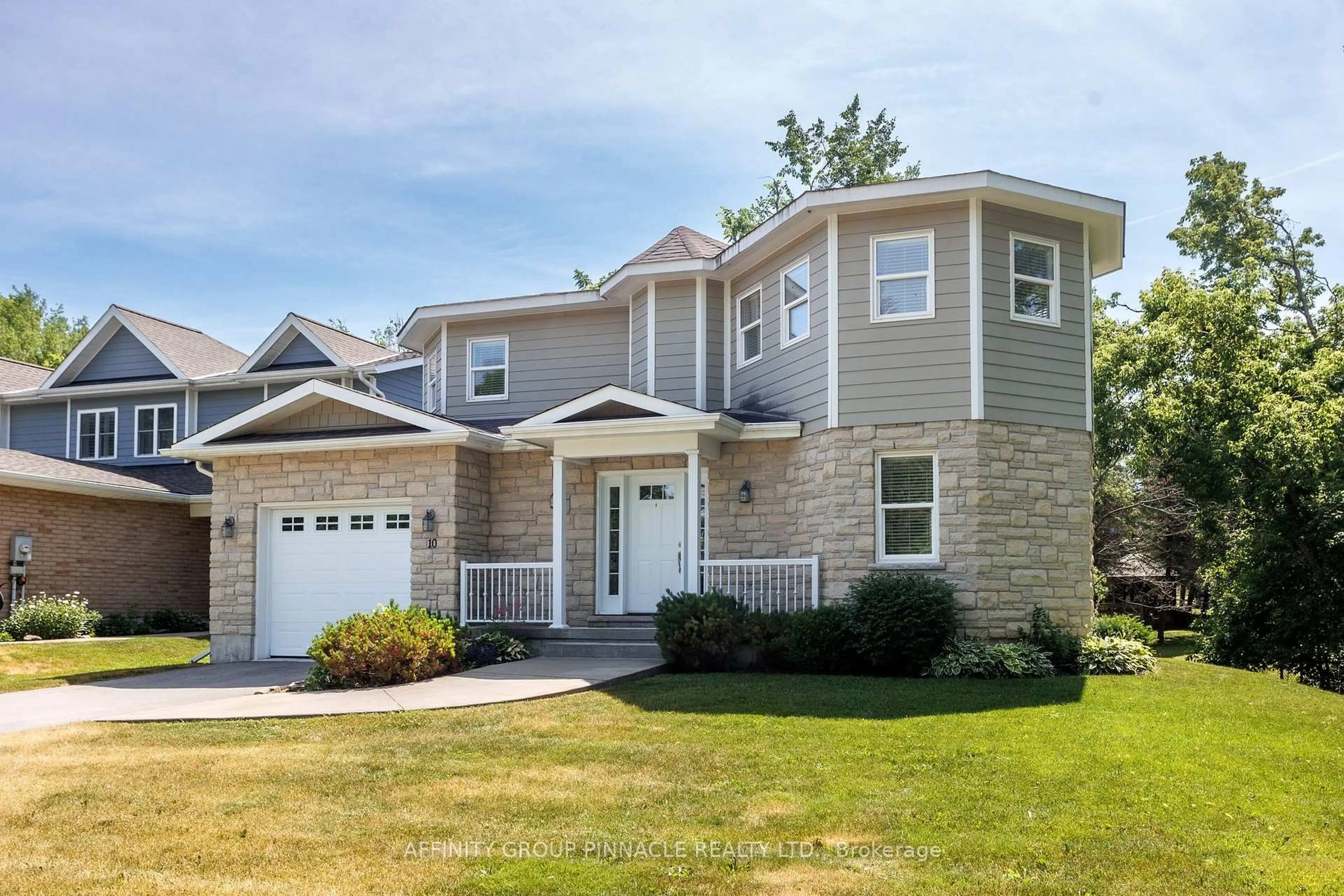 Home with vinyl exterior material, street for 10 Deane St, Kawartha Lakes Ontario K0M 1N0