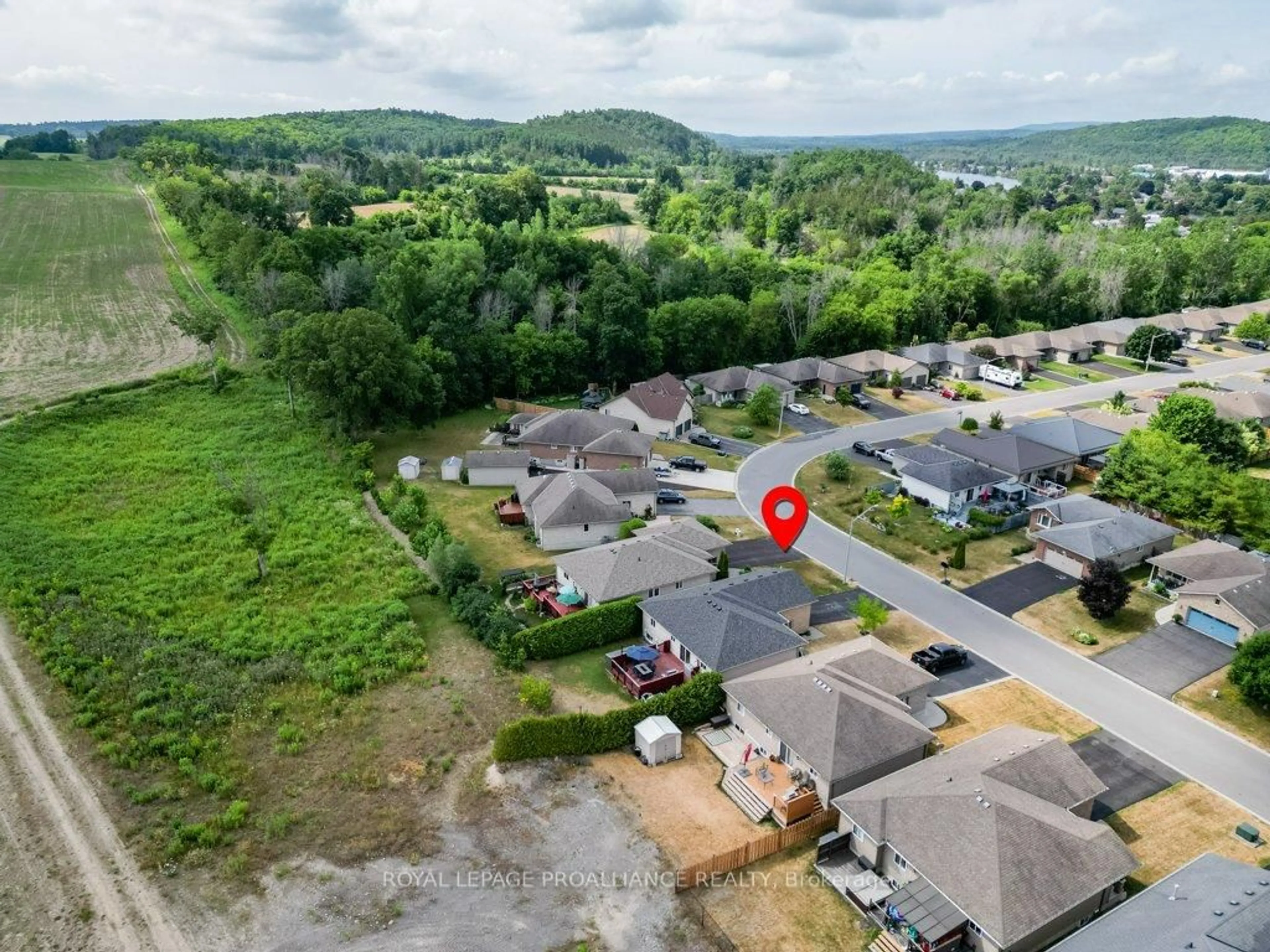A pic from outside/outdoor area/front of a property/back of a property/a pic from drone, mountain view for 52 Cedar Creek Way, Hastings Ontario K0K 2C0