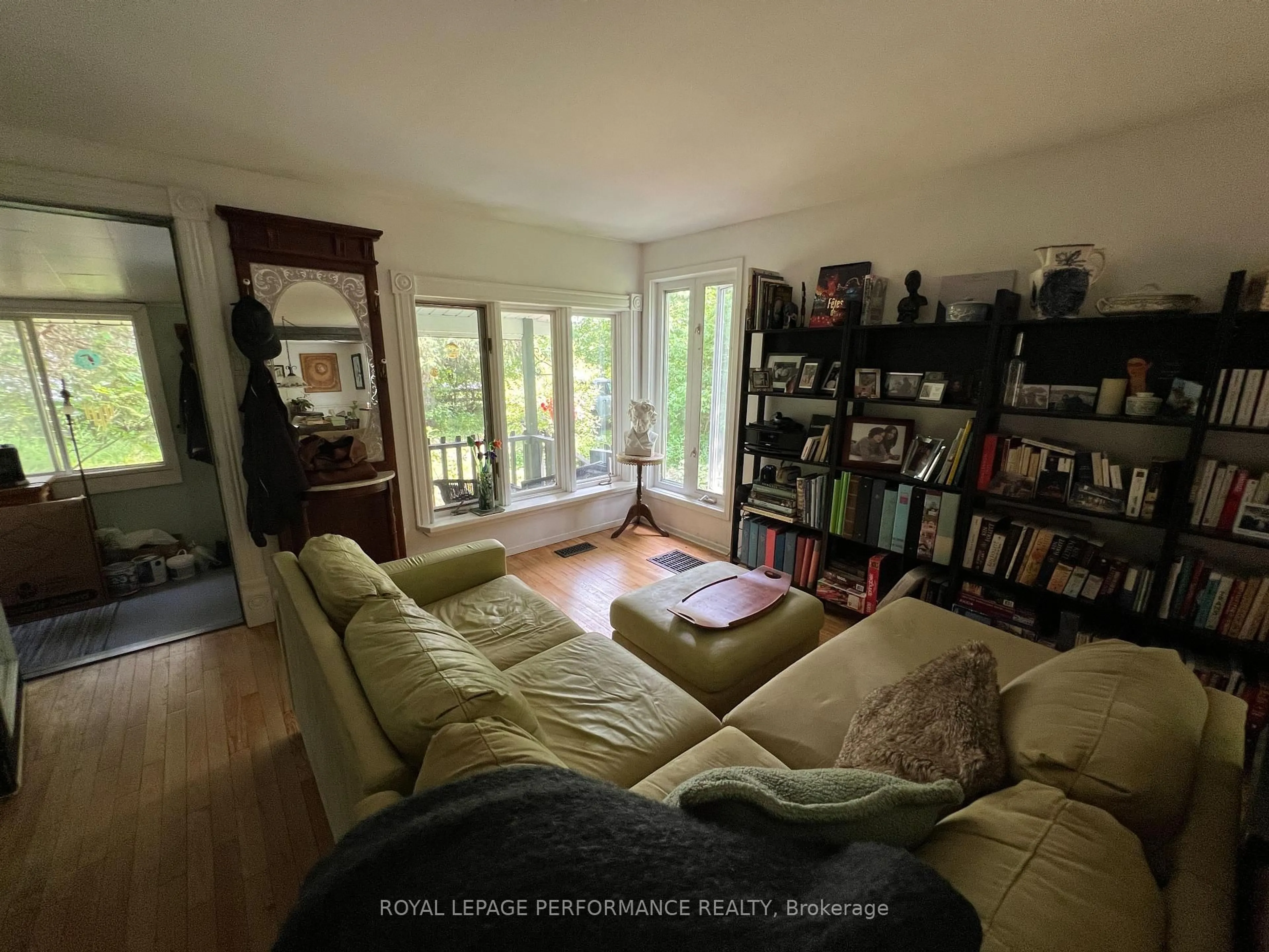 Living room with furniture, wood/laminate floor for 20156 Beaupre Rd, South Glengarry Ontario K0C 1L0