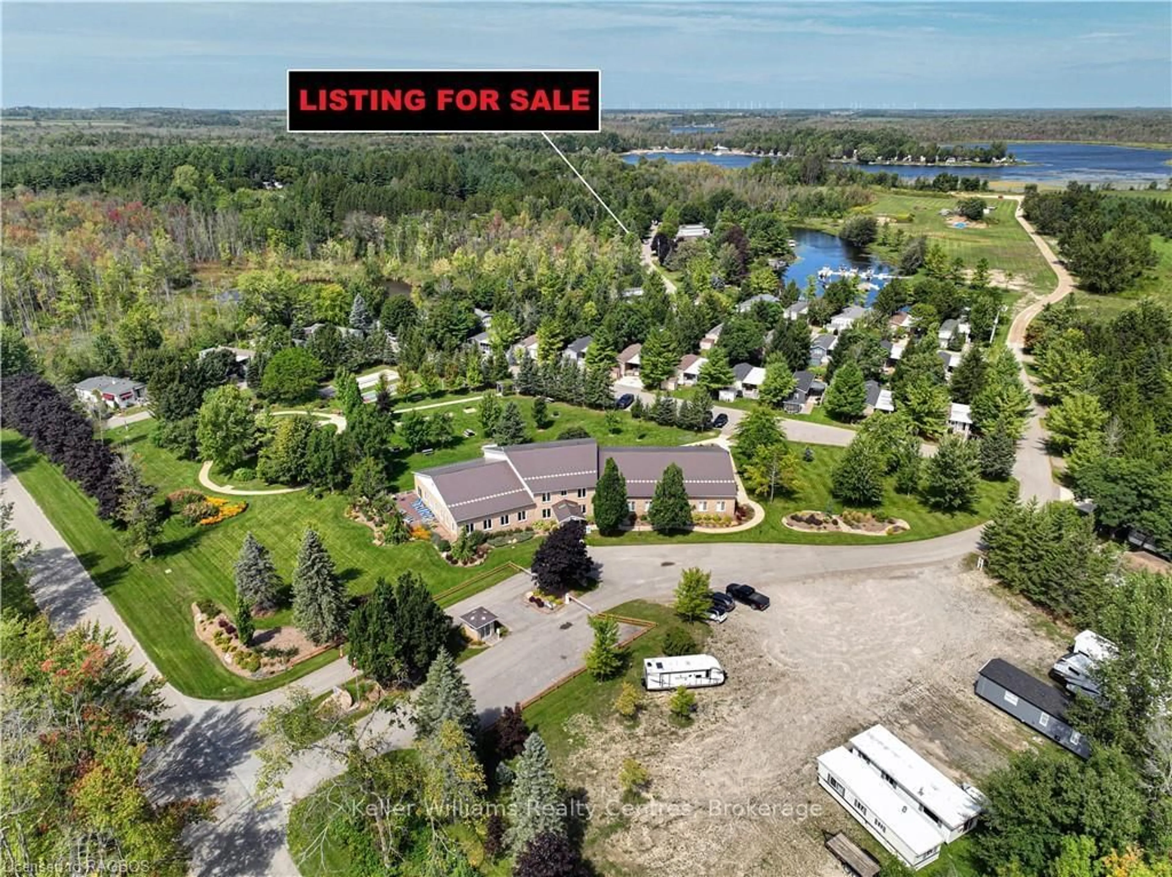 A pic from outside/outdoor area/front of a property/back of a property/a pic from drone, water/lake/river/ocean view for 13 SOUTHLINE Ave #M44, Huron-Kinloss Ontario N0G 2B0
