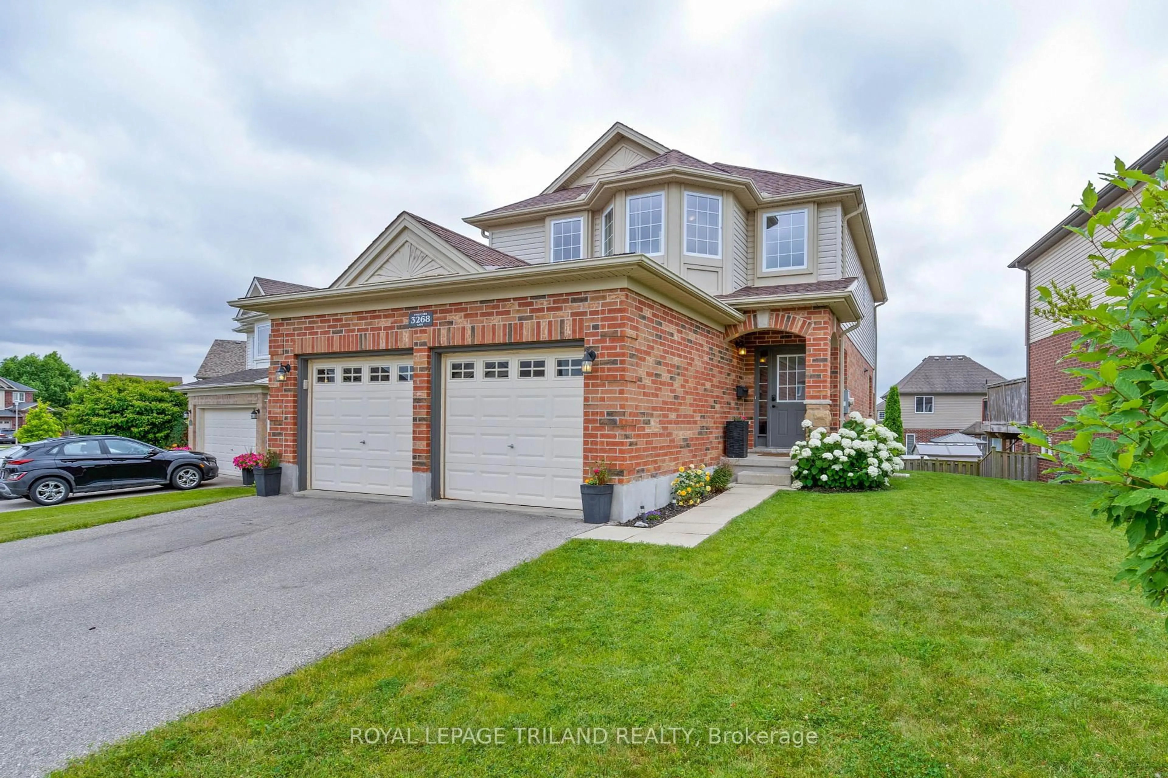 Home with brick exterior material, street for 3268 Emilycarr Lane, London South Ontario N6L 0B2