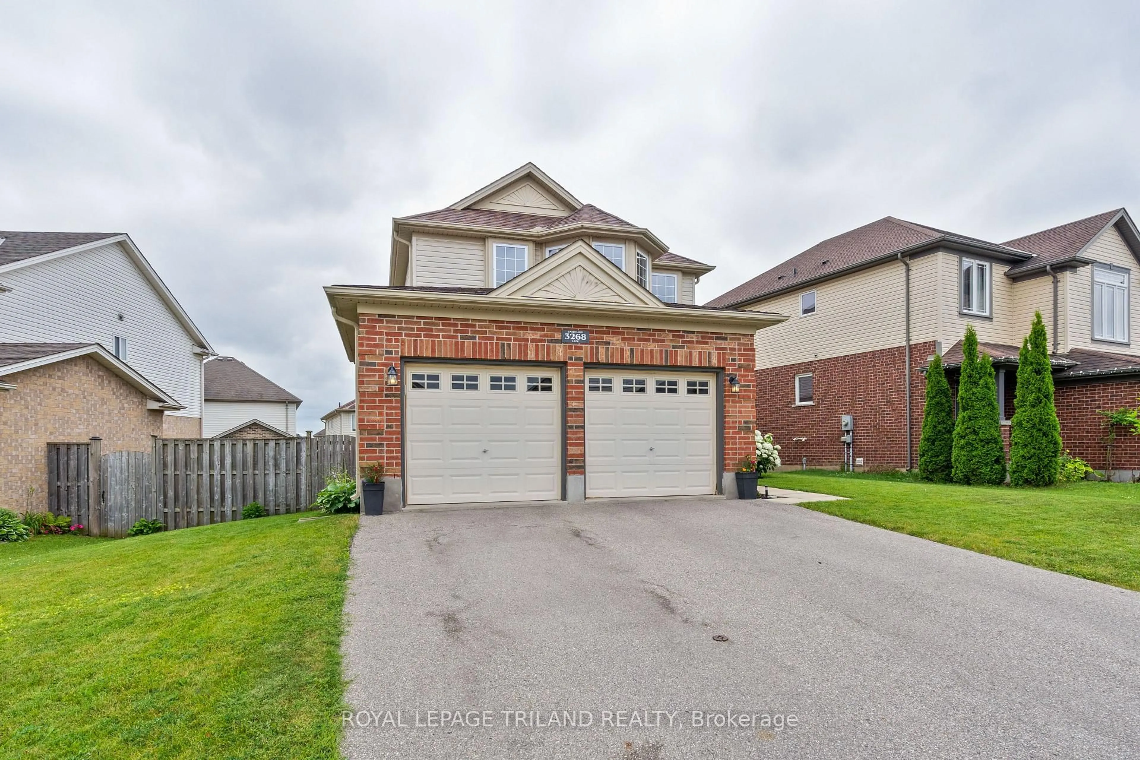 Home with brick exterior material, street for 3268 EmilyCarr Lane, London South Ontario N6L 0B2