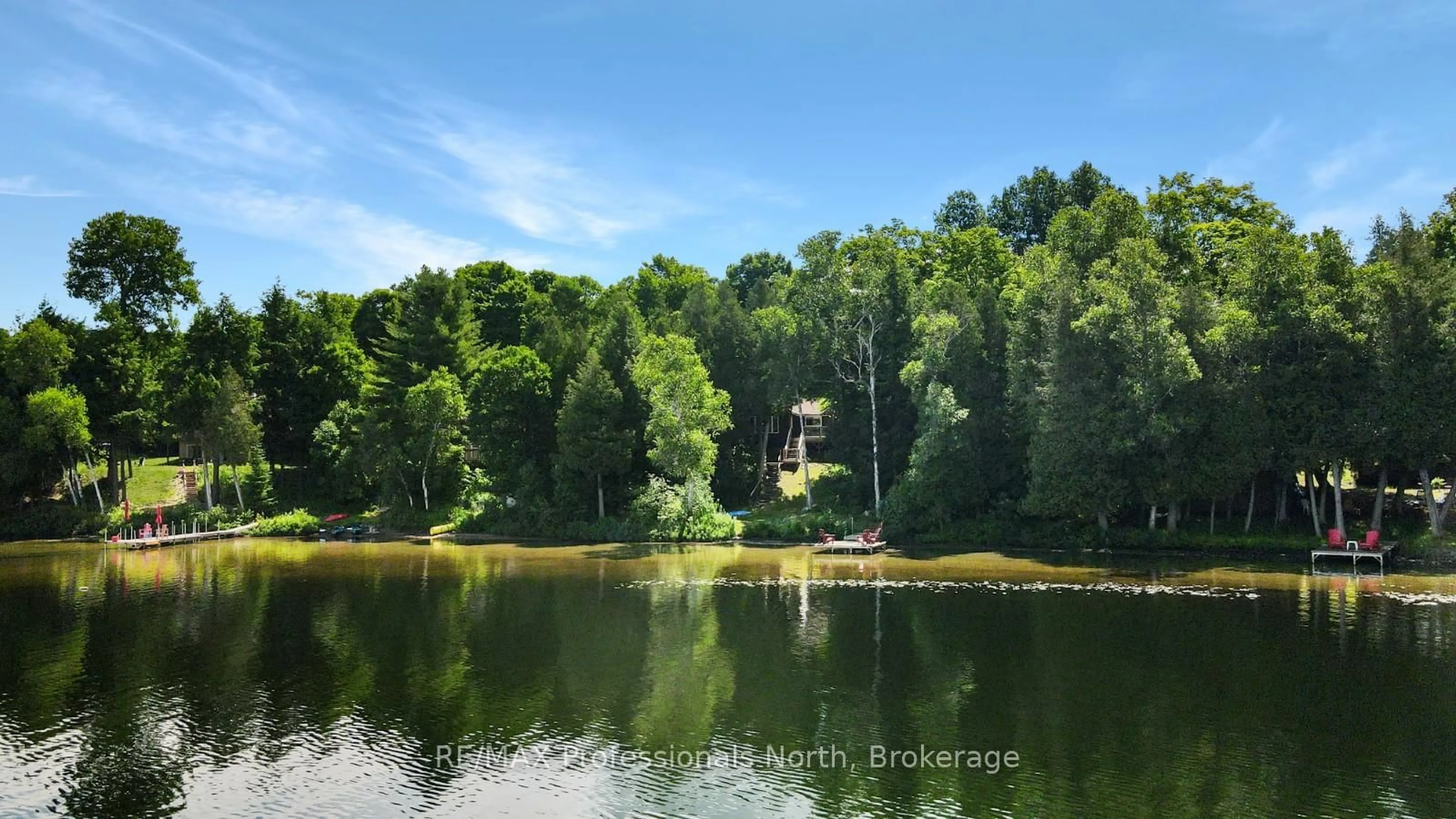 A pic from outside/outdoor area/front of a property/back of a property/a pic from drone, water/lake/river/ocean view for 1144 Fry Lane, Algonquin Highlands Ontario K0M 1S0