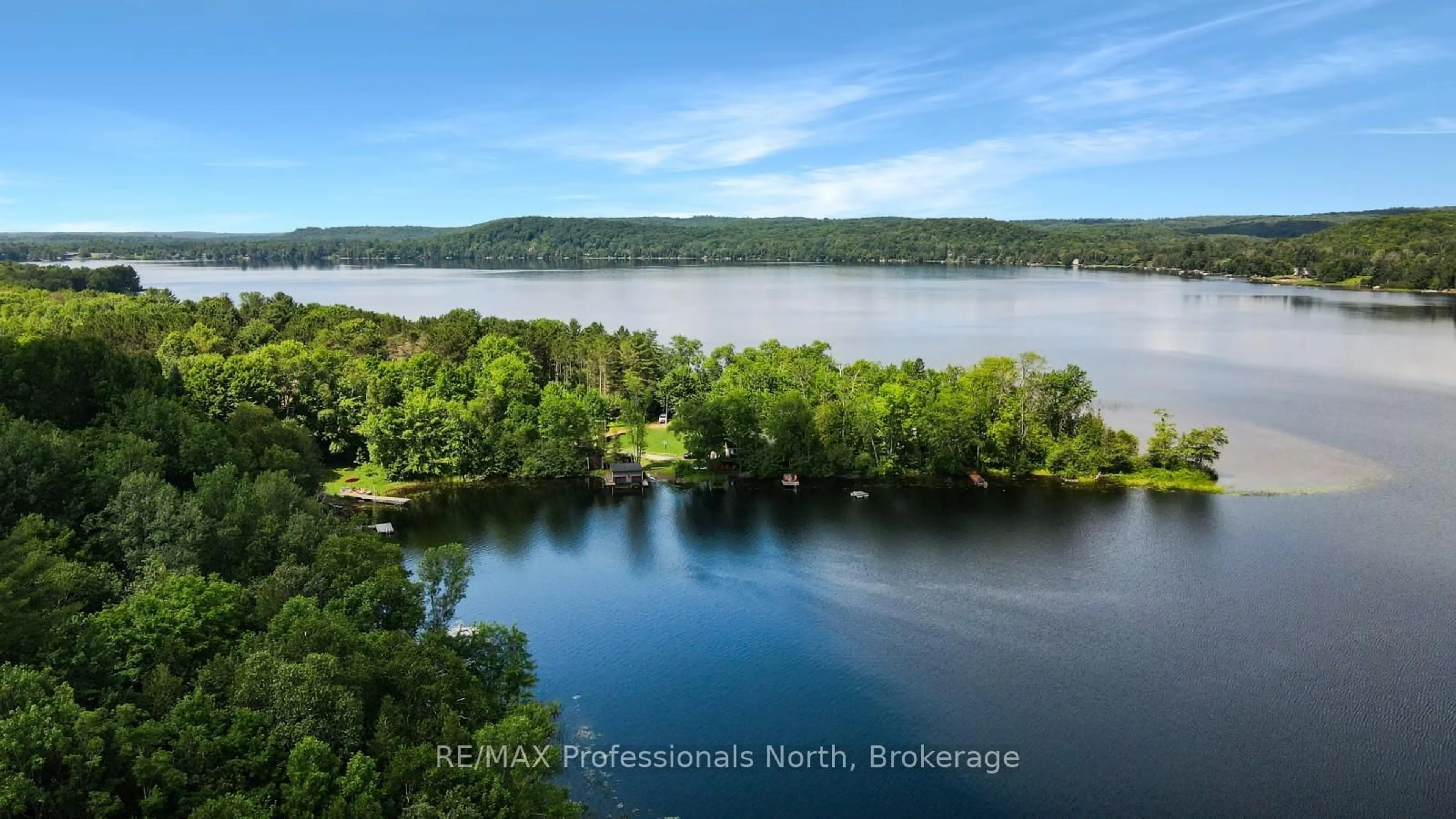 A pic from outside/outdoor area/front of a property/back of a property/a pic from drone, water/lake/river/ocean view for 1144 Fry Lane, Algonquin Highlands Ontario K0M 1S0