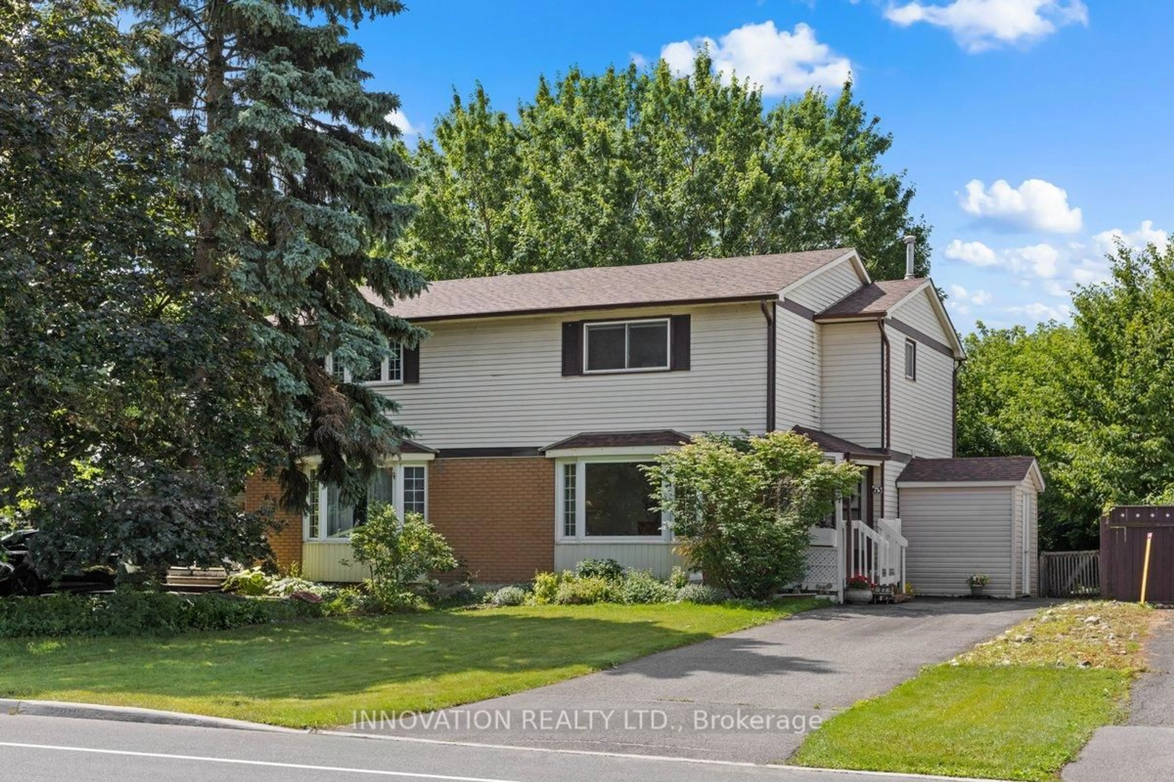 Home with vinyl exterior material, street for 63 Castlefrank Rd, Ottawa Ontario K2L 2E6