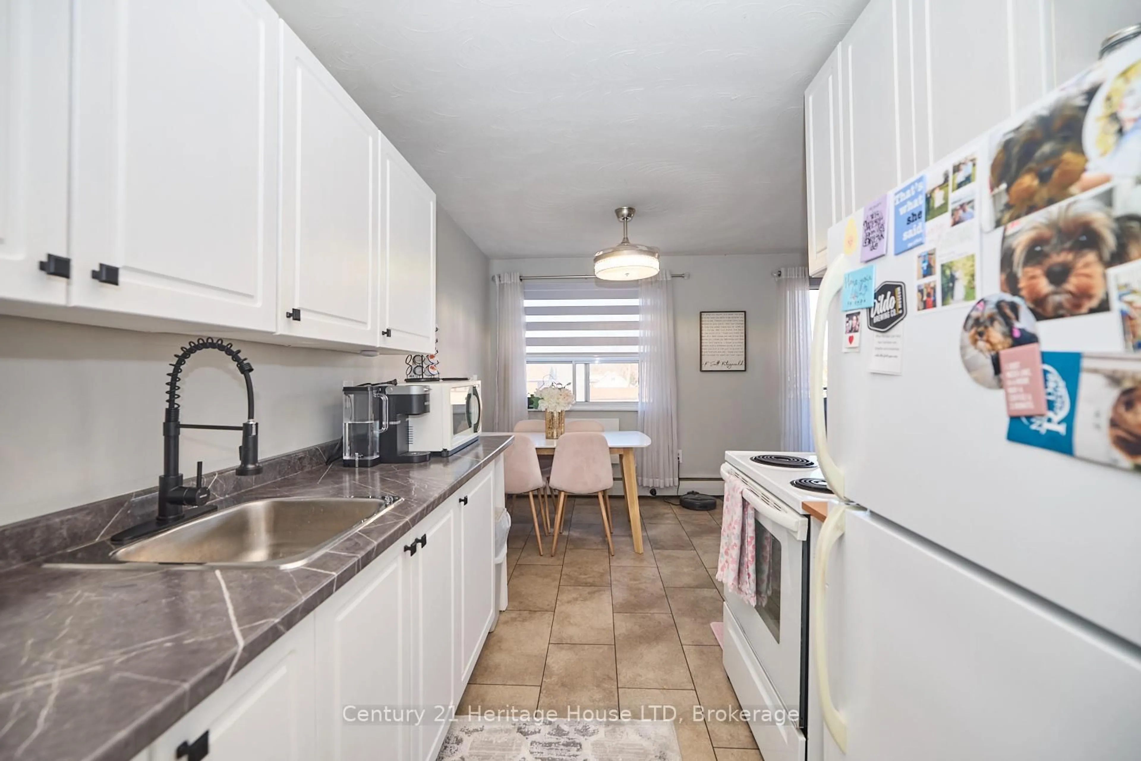 Standard kitchen, ceramic/tile floor for 485 Thorold Rd #205, Welland Ontario L3C 3X1