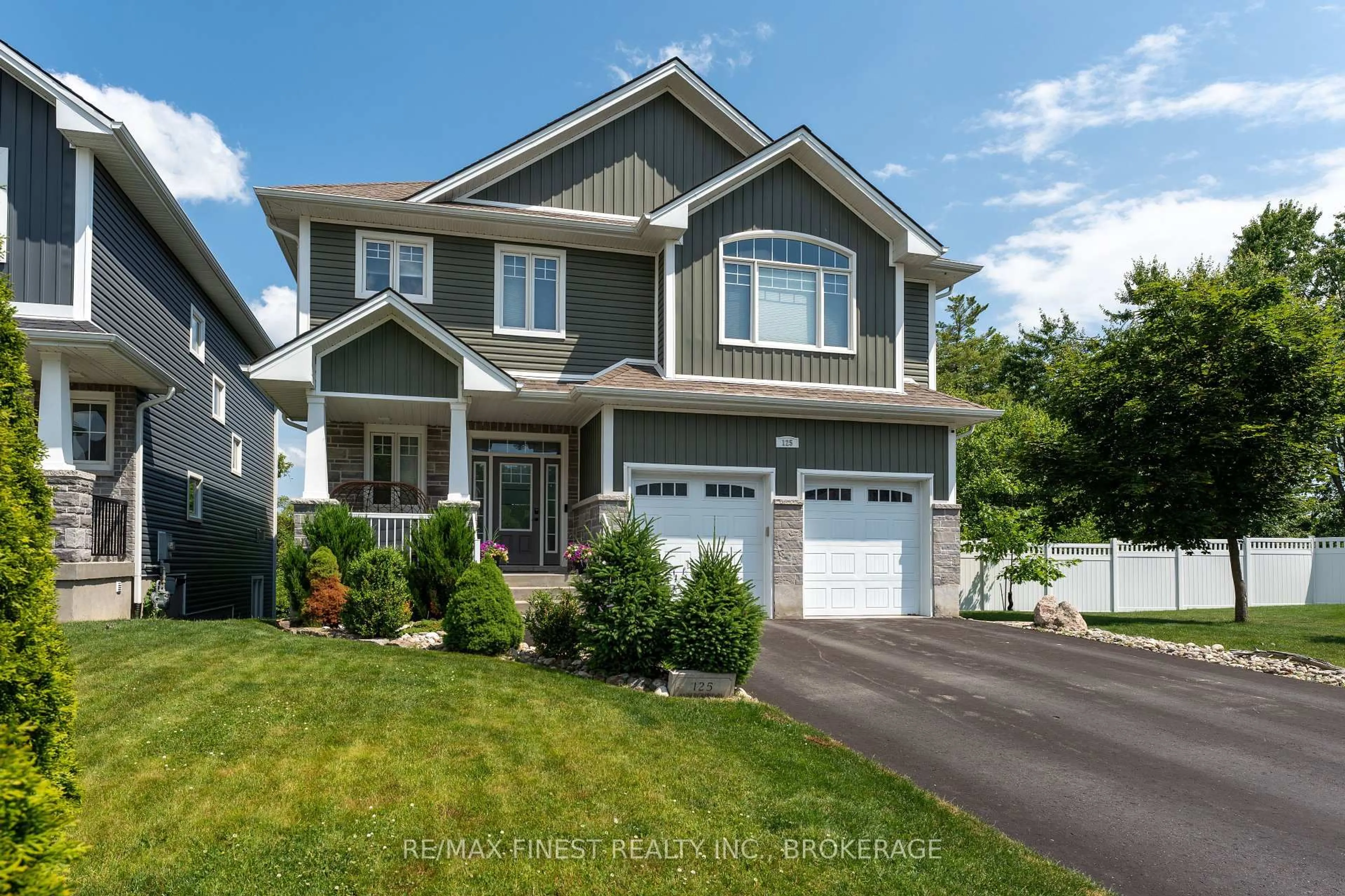Home with vinyl exterior material, street for 125 Aldergrove Pl, Kingston Ontario K7M 3N1