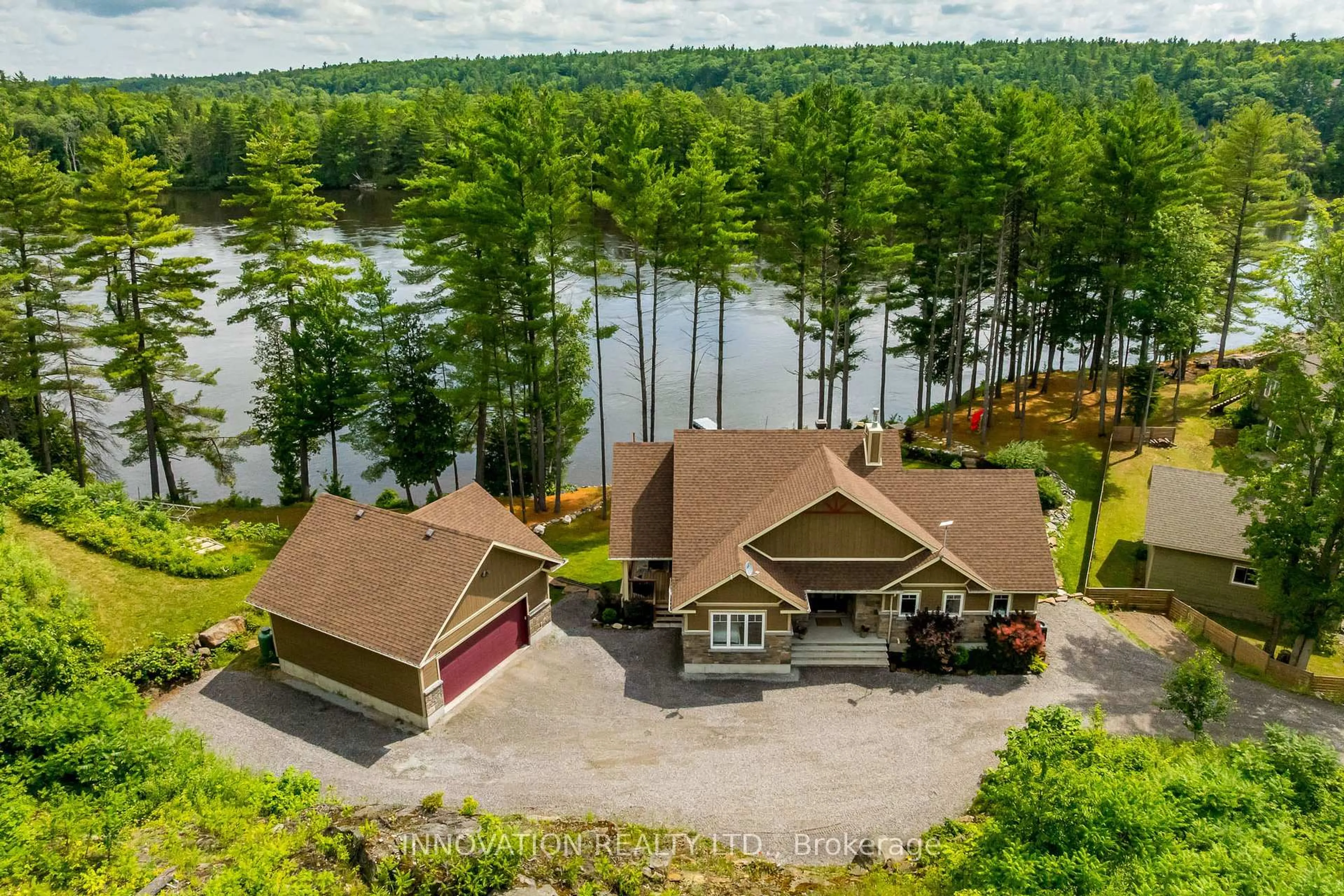 A pic from outside/outdoor area/front of a property/back of a property/a pic from drone, water/lake/river/ocean view for 103 A Carriage Landing Dr, Haley Station Ontario K0J 1Y0
