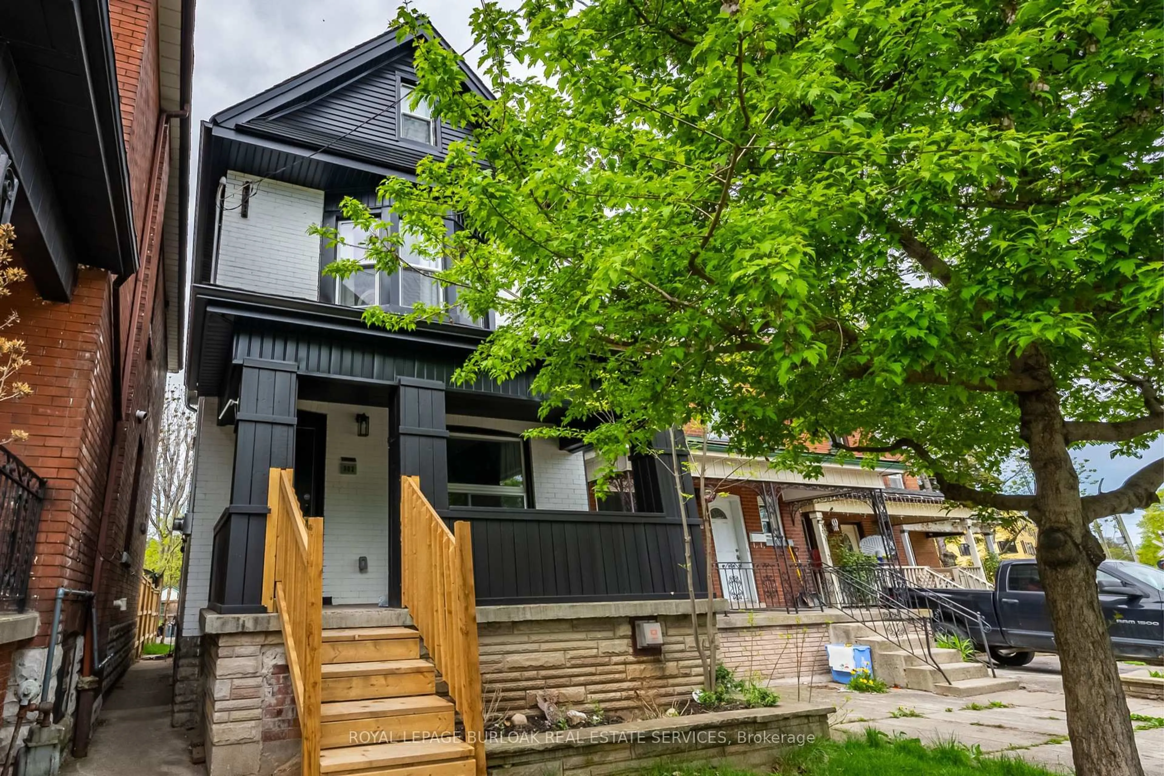 Home with brick exterior material, street for 302 Dunsmure Rd, Hamilton Ontario L8M 1T1