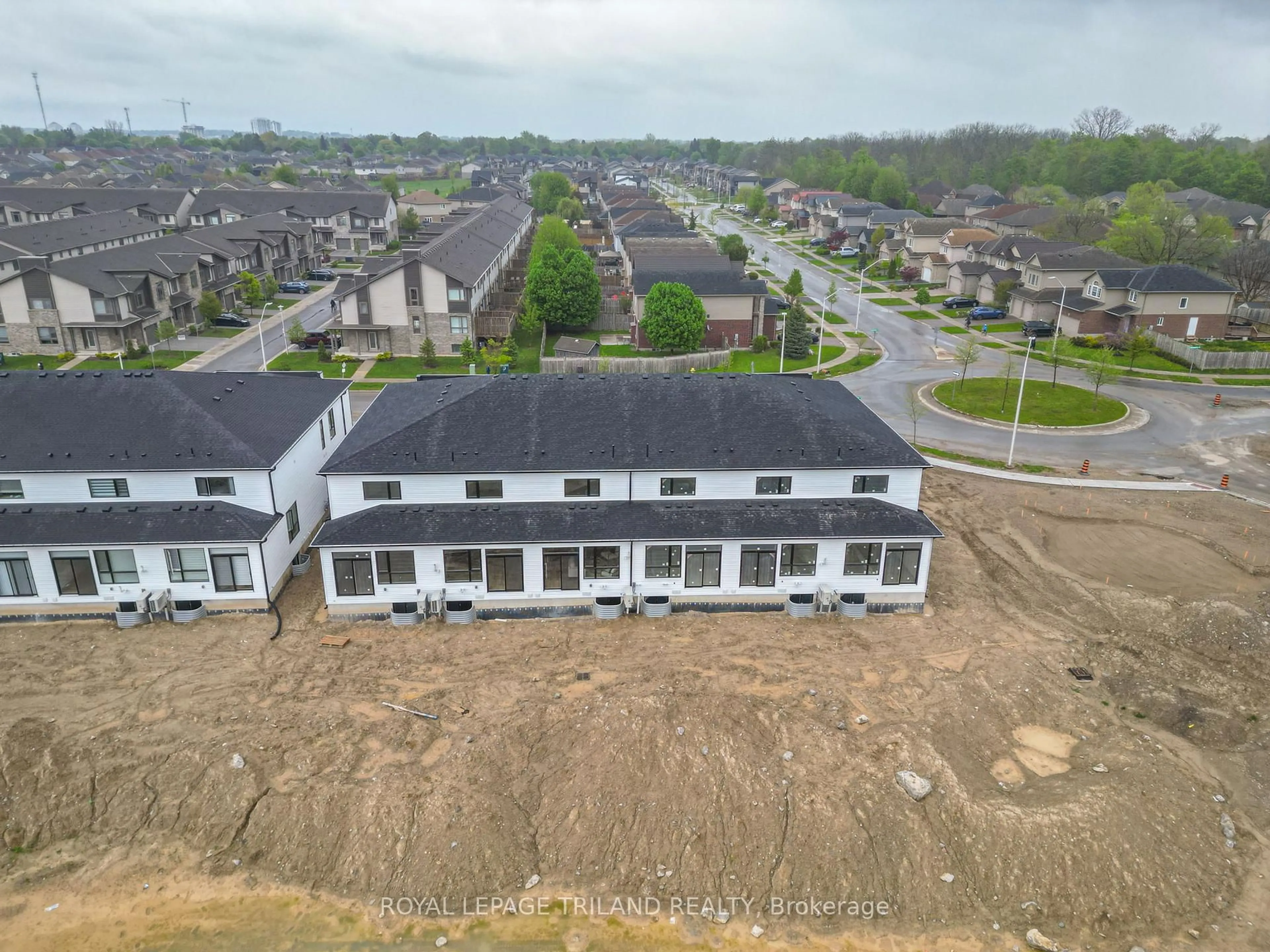 A pic from outside/outdoor area/front of a property/back of a property/a pic from drone, building for 1855 Dalmagarry Rd, London North Ontario N6G 0A6