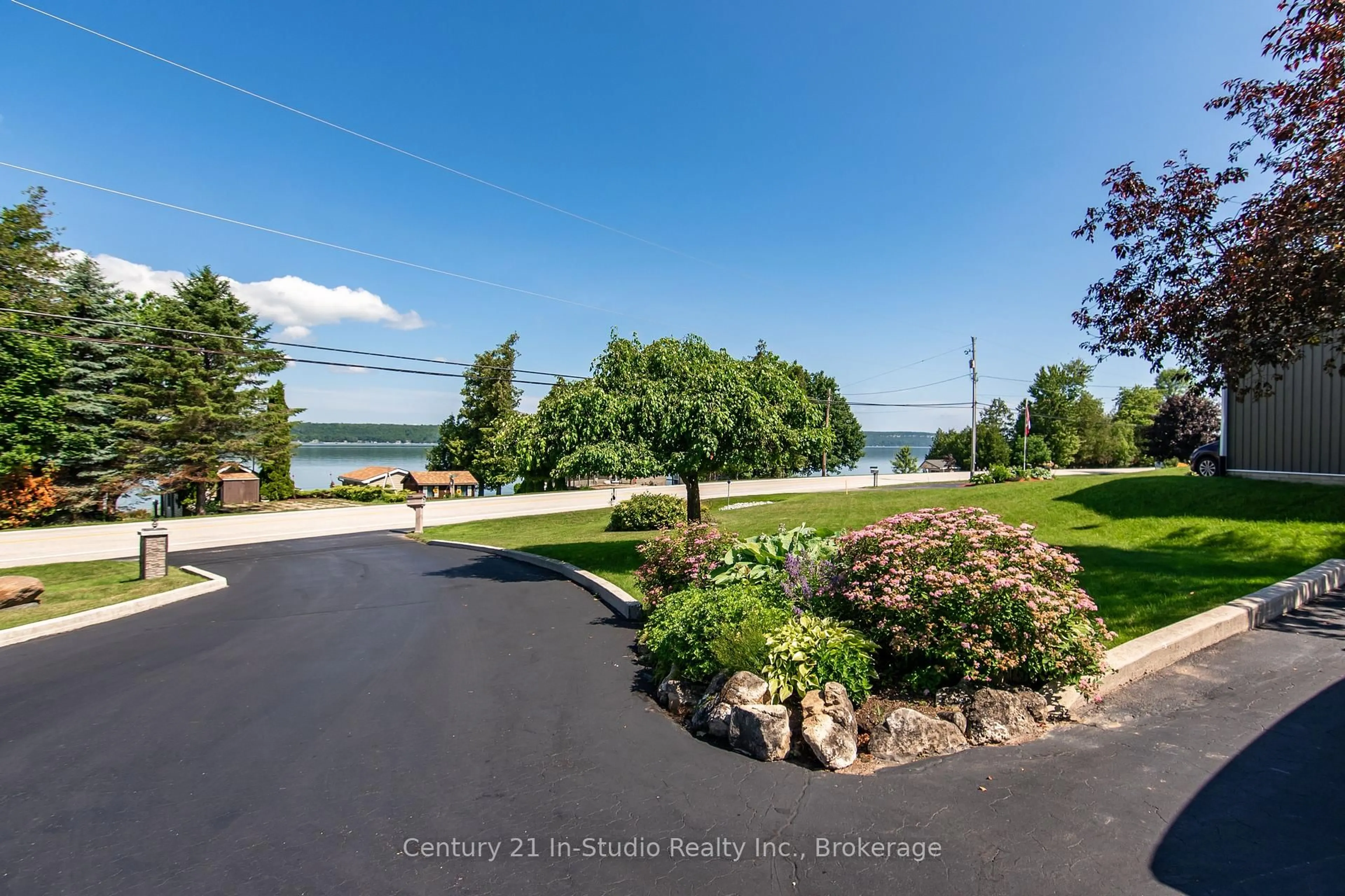 A pic from outside/outdoor area/front of a property/back of a property/a pic from drone, water/lake/river/ocean view for 502230 Grey Road 1 Rd, Georgian Bluffs Ontario N0H 2T0