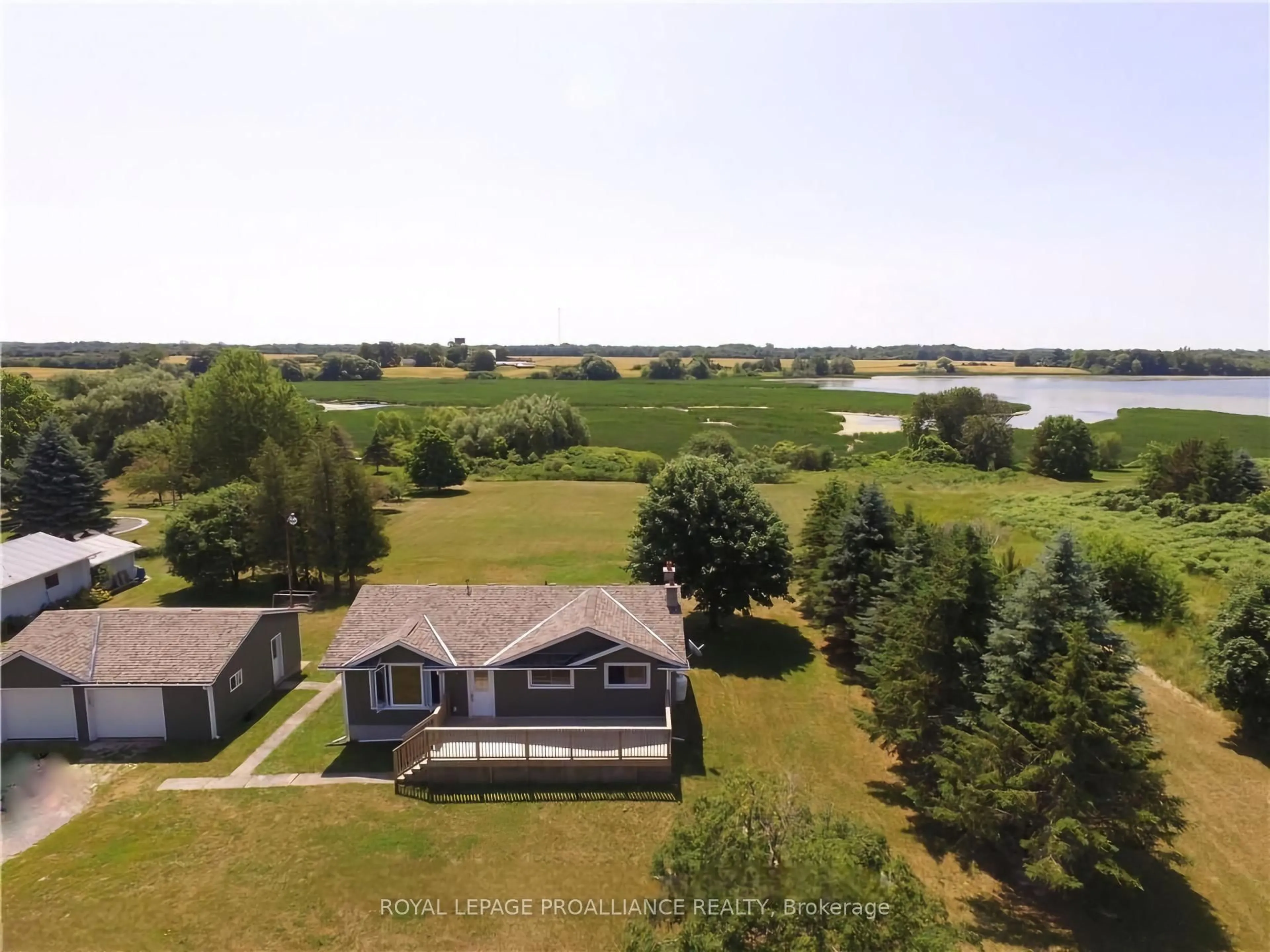 A pic from outside/outdoor area/front of a property/back of a property/a pic from drone, water/lake/river/ocean view for 19185 LOYALIST Pkwy, Prince Edward County Ontario K0K 1T0