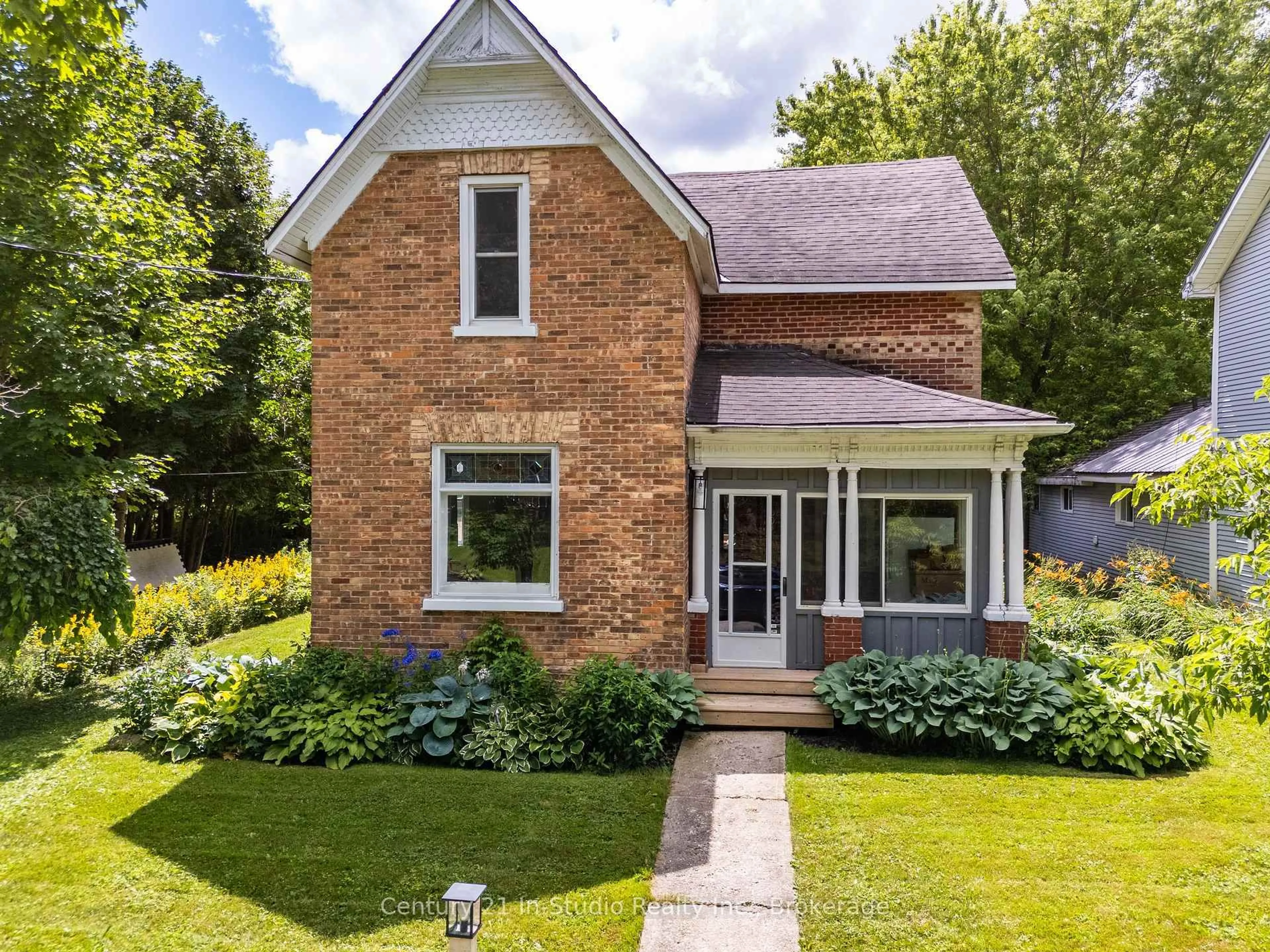 Home with brick exterior material, street for 16 Peter St, Grey Highlands Ontario N0C 1E0