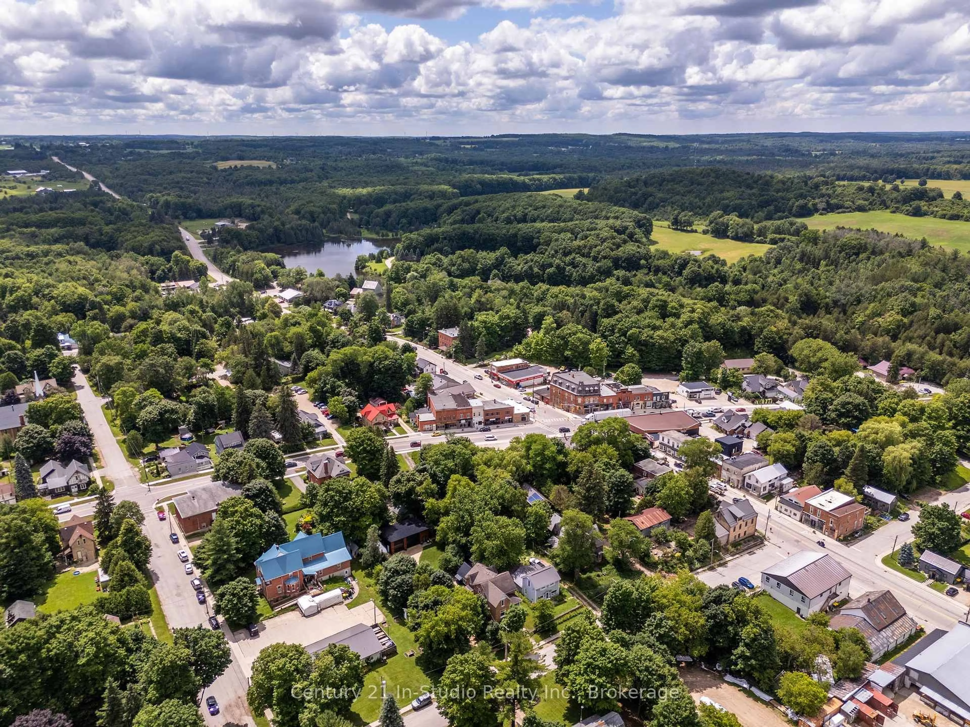 A pic from outside/outdoor area/front of a property/back of a property/a pic from drone, water/lake/river/ocean view for 16 Peter St, Grey Highlands Ontario N0C 1E0