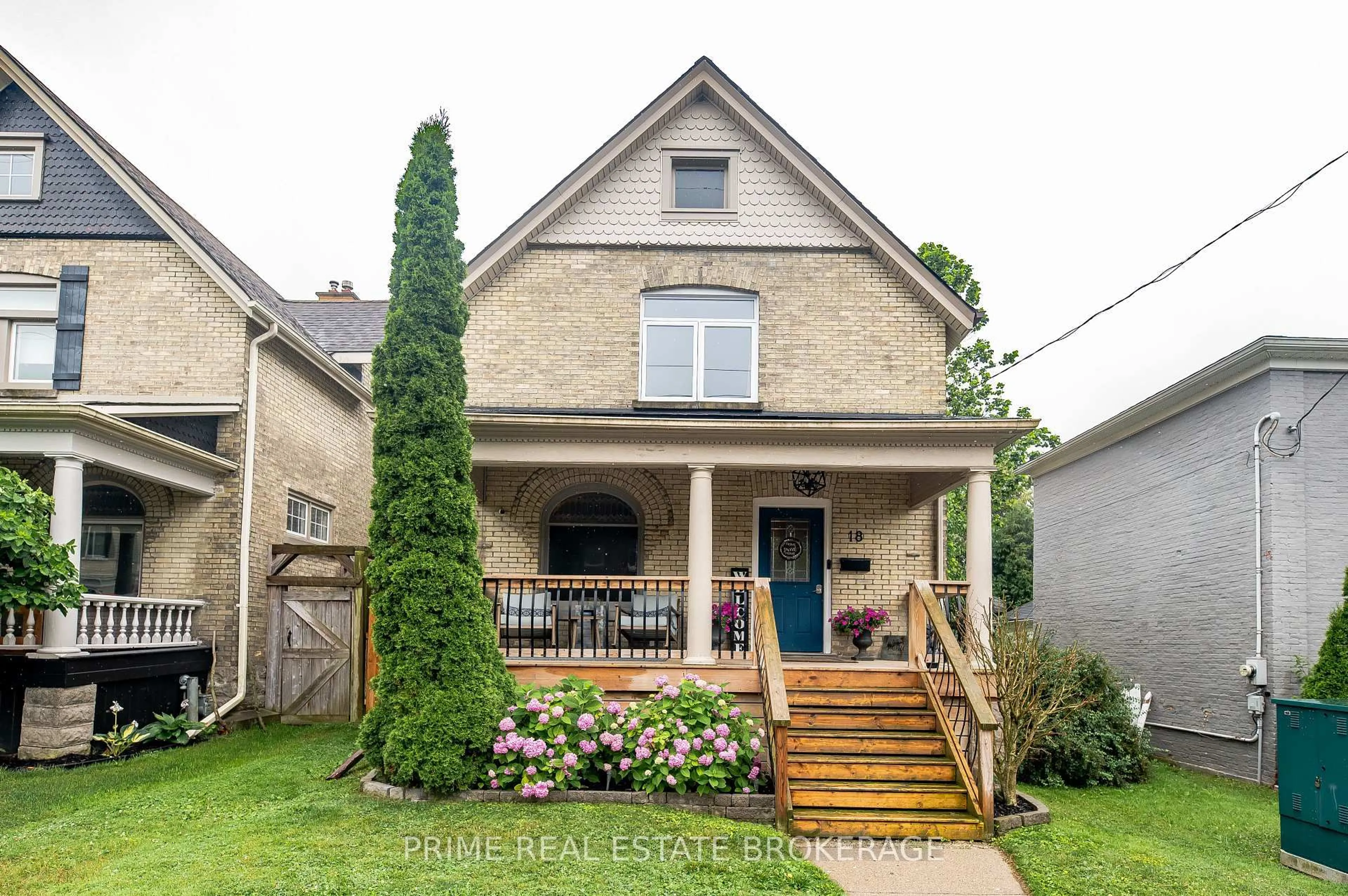 Home with brick exterior material, street for 18 Victoria St, St. Thomas Ontario N5R 2E5