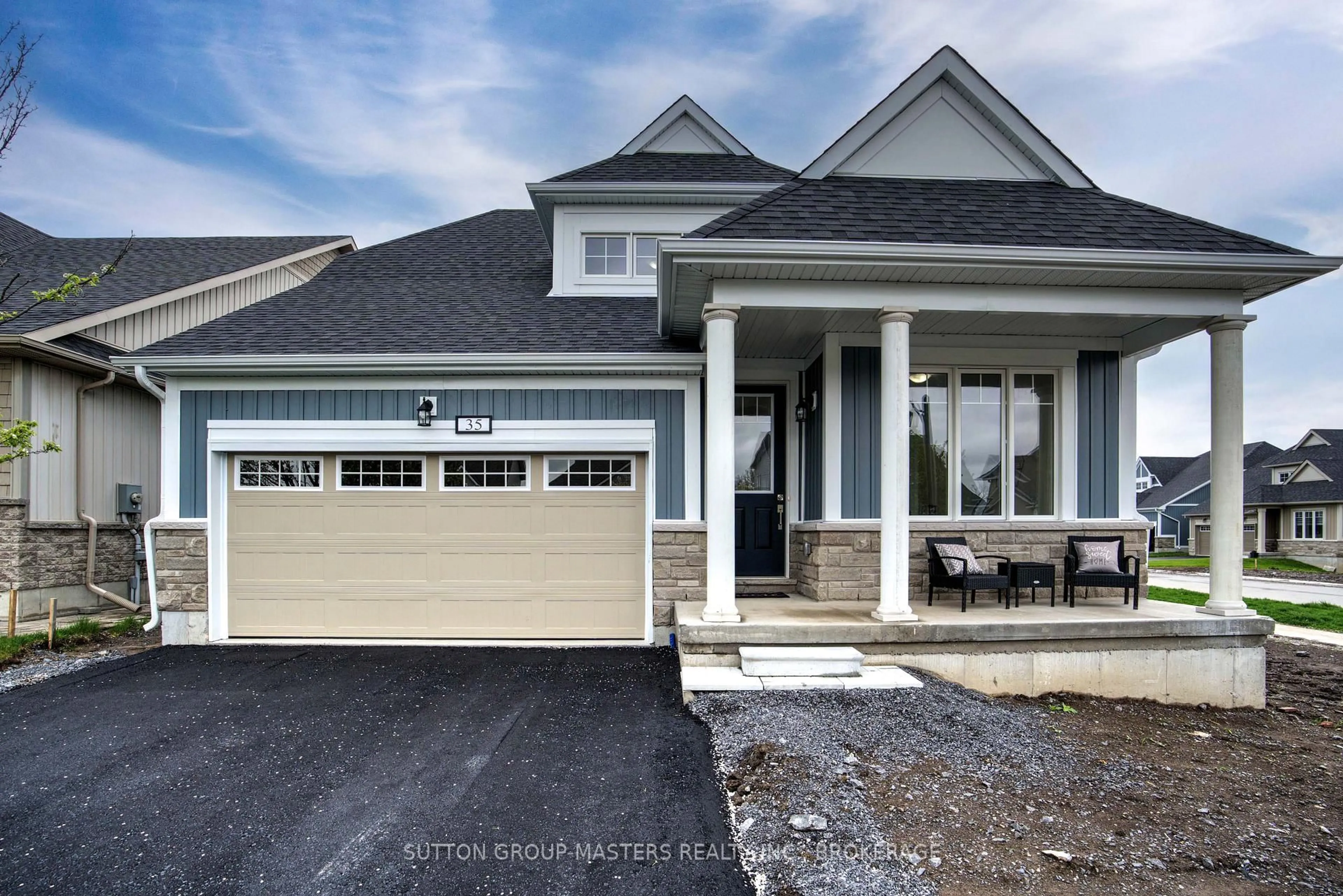 Home with vinyl exterior material, street for 35 Country Club Dr, Bath Ontario K0H 1G0