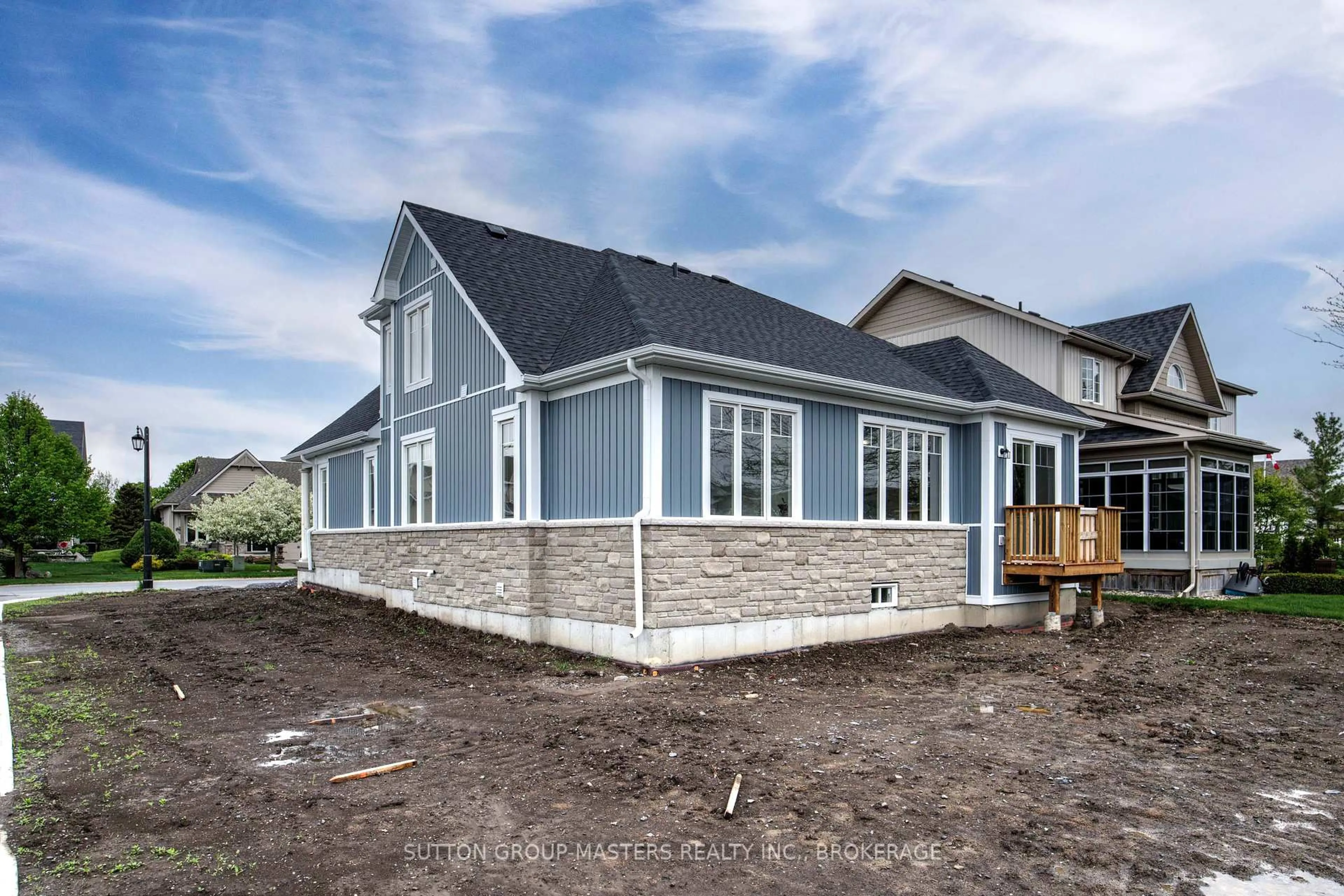 Home with vinyl exterior material, building for 35 Country Club Dr, Bath Ontario K0H 1G0