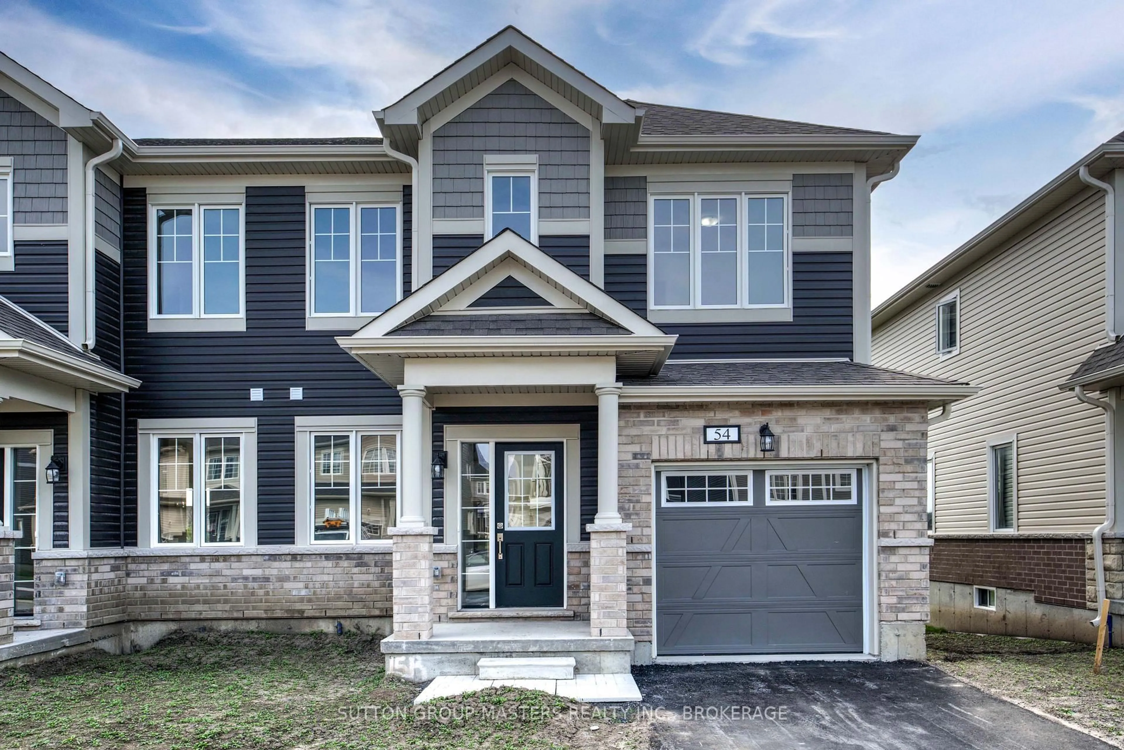 Home with brick exterior material, street for 54 Golf Links Dr, Bath Ontario K0H 1G0