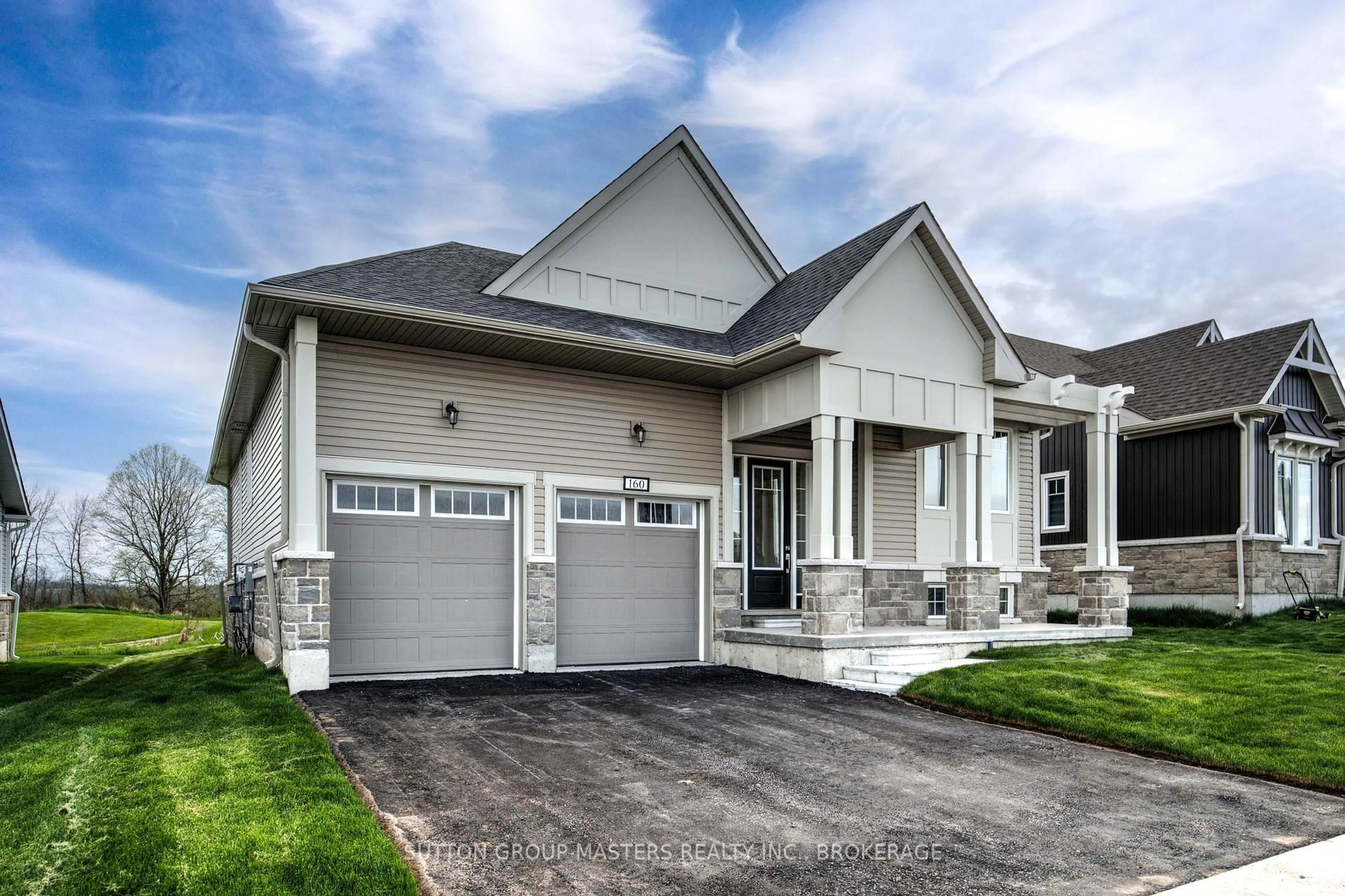 Home with brick exterior material, street for 160 Country Club Dr, Bath Ontario K0H 1G0