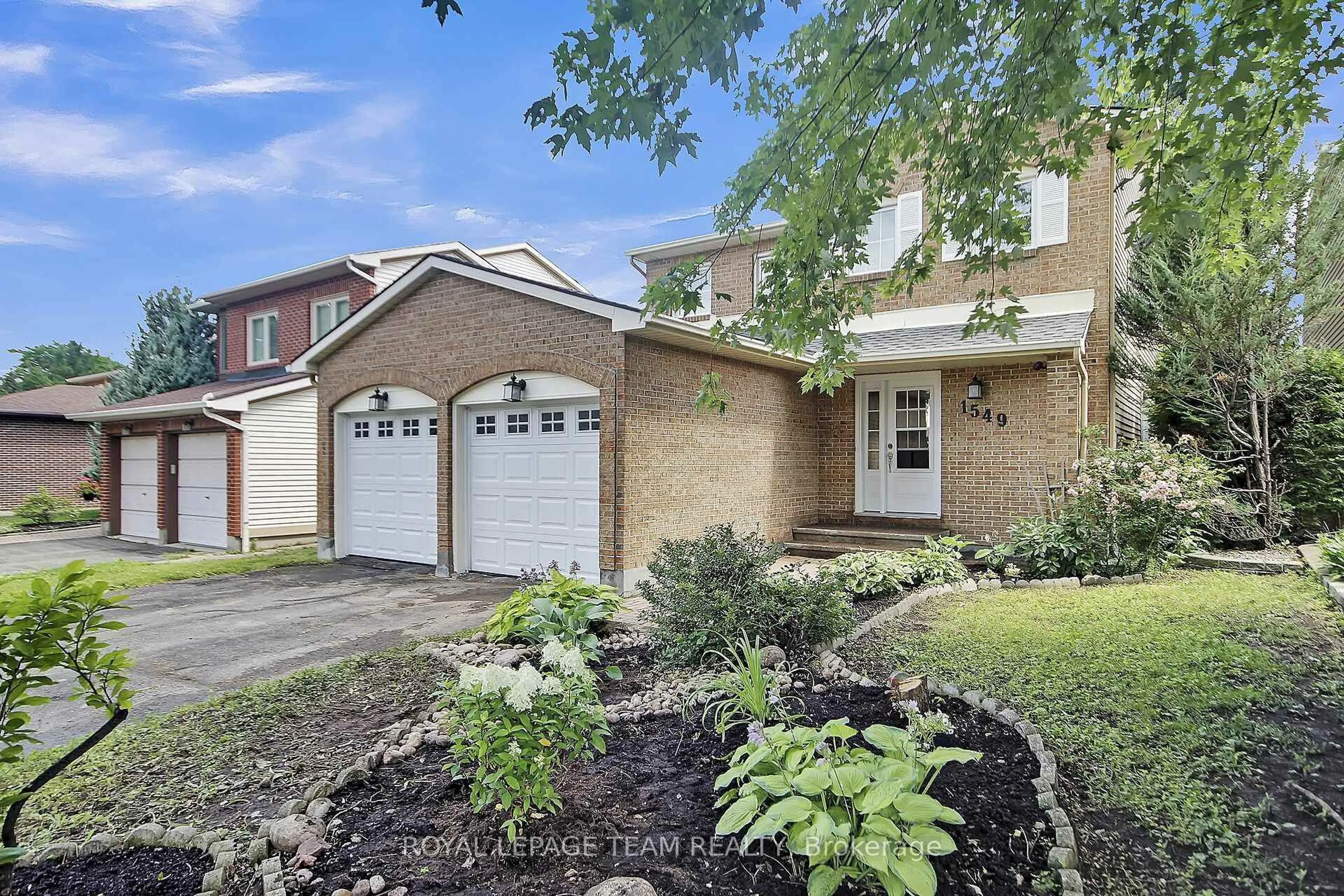 Home with brick exterior material, street for 1549 Meadowfield Pl, Ottawa Ontario K1C 5W1
