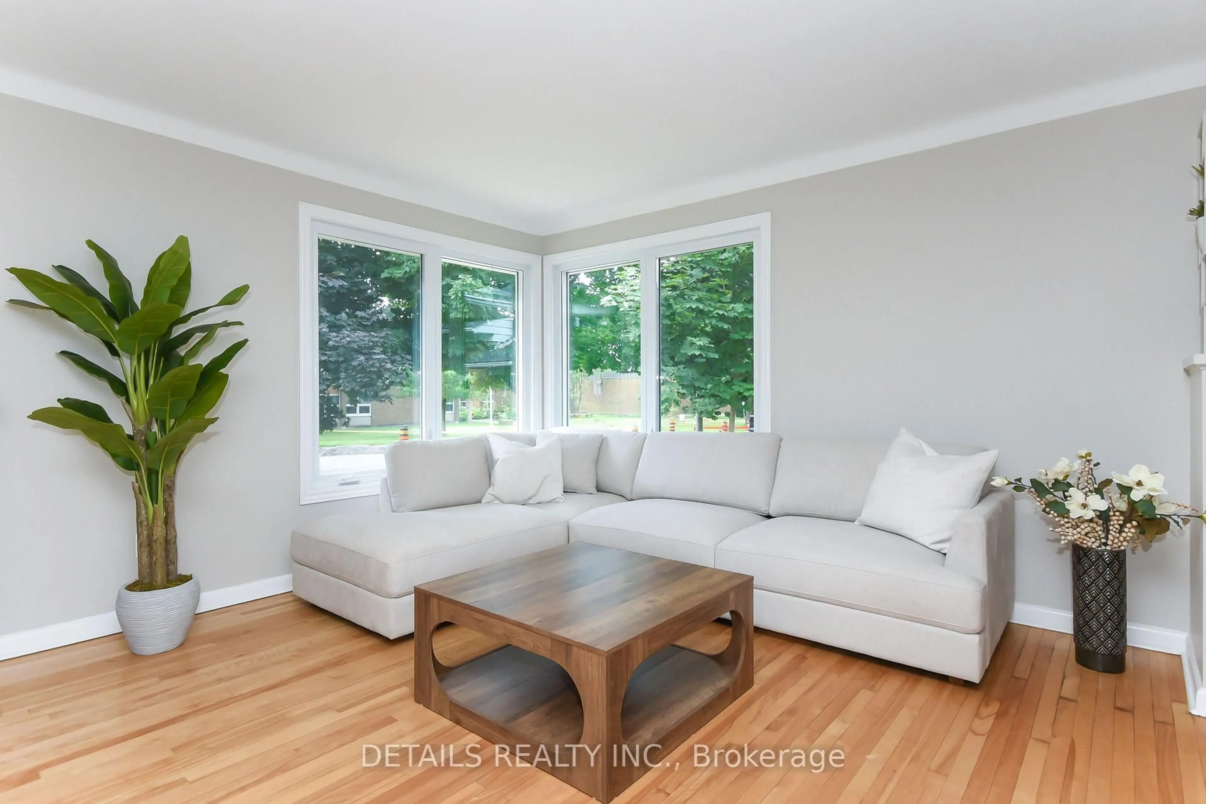 Living room with furniture, wood/laminate floor for 1300 Field St, Ottawa Ontario K2C 2R3