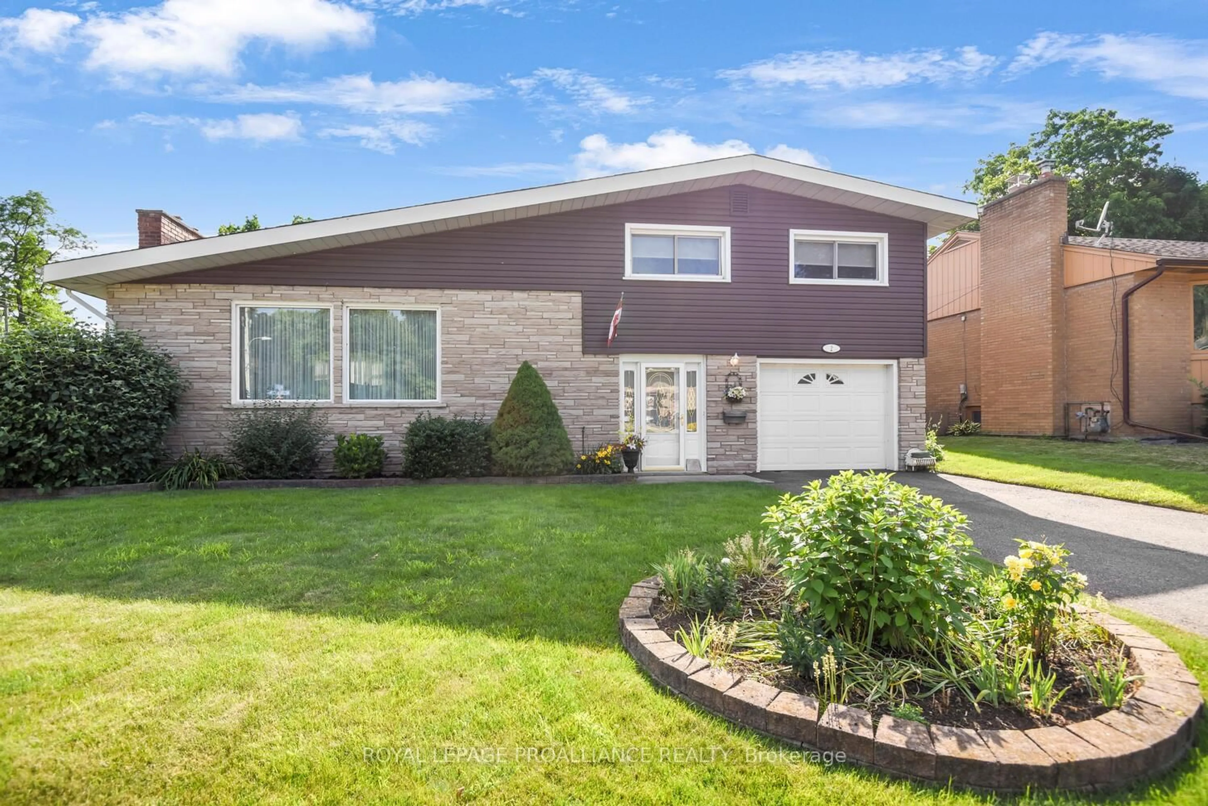 Home with brick exterior material, street for 2 Woodlawn Pl, Brockville Ontario K6V 2Z2