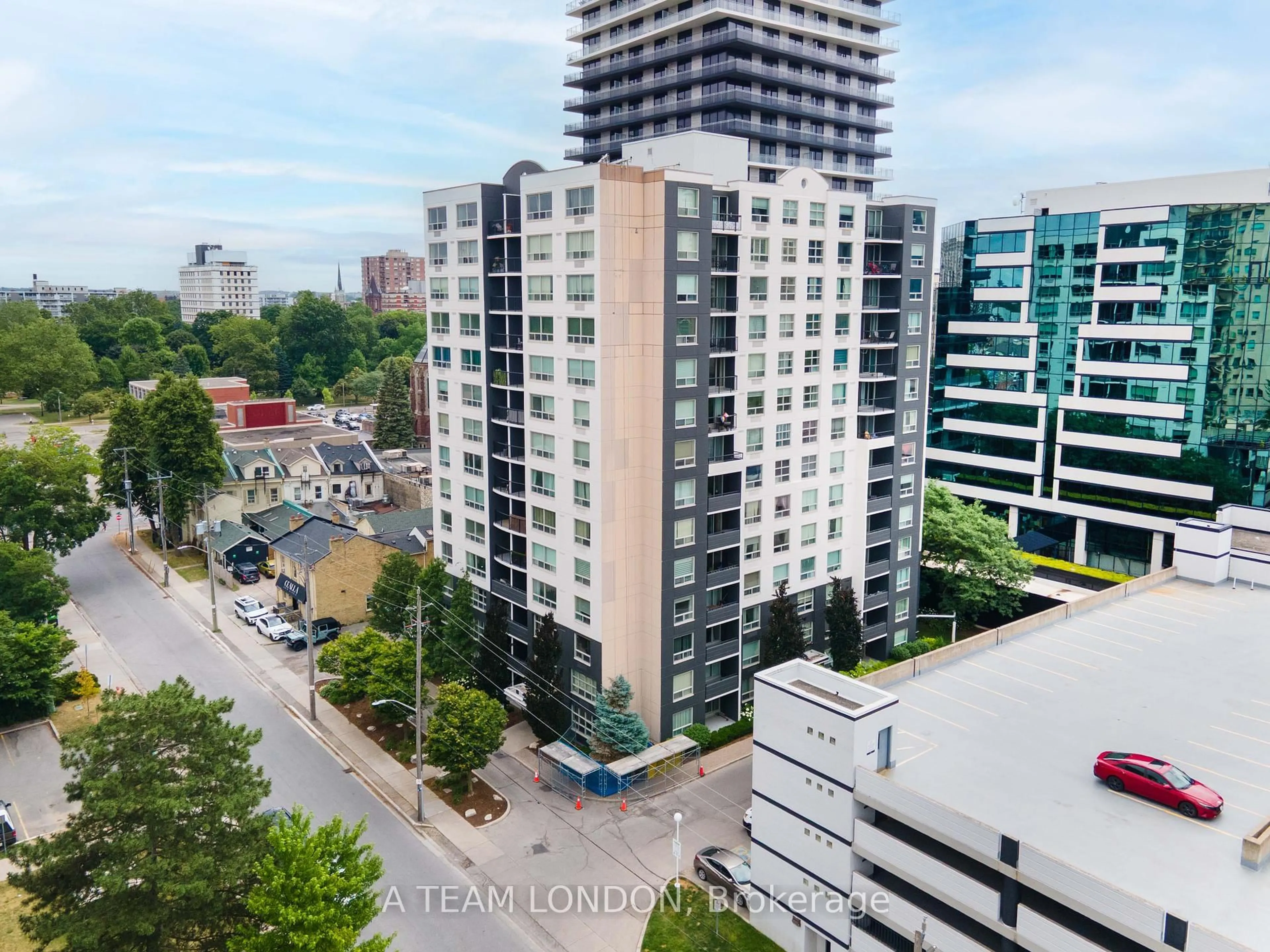 A pic from outside/outdoor area/front of a property/back of a property/a pic from drone, city buildings view from balcony for 155 KENT St #407, London East Ontario N6A 5N7