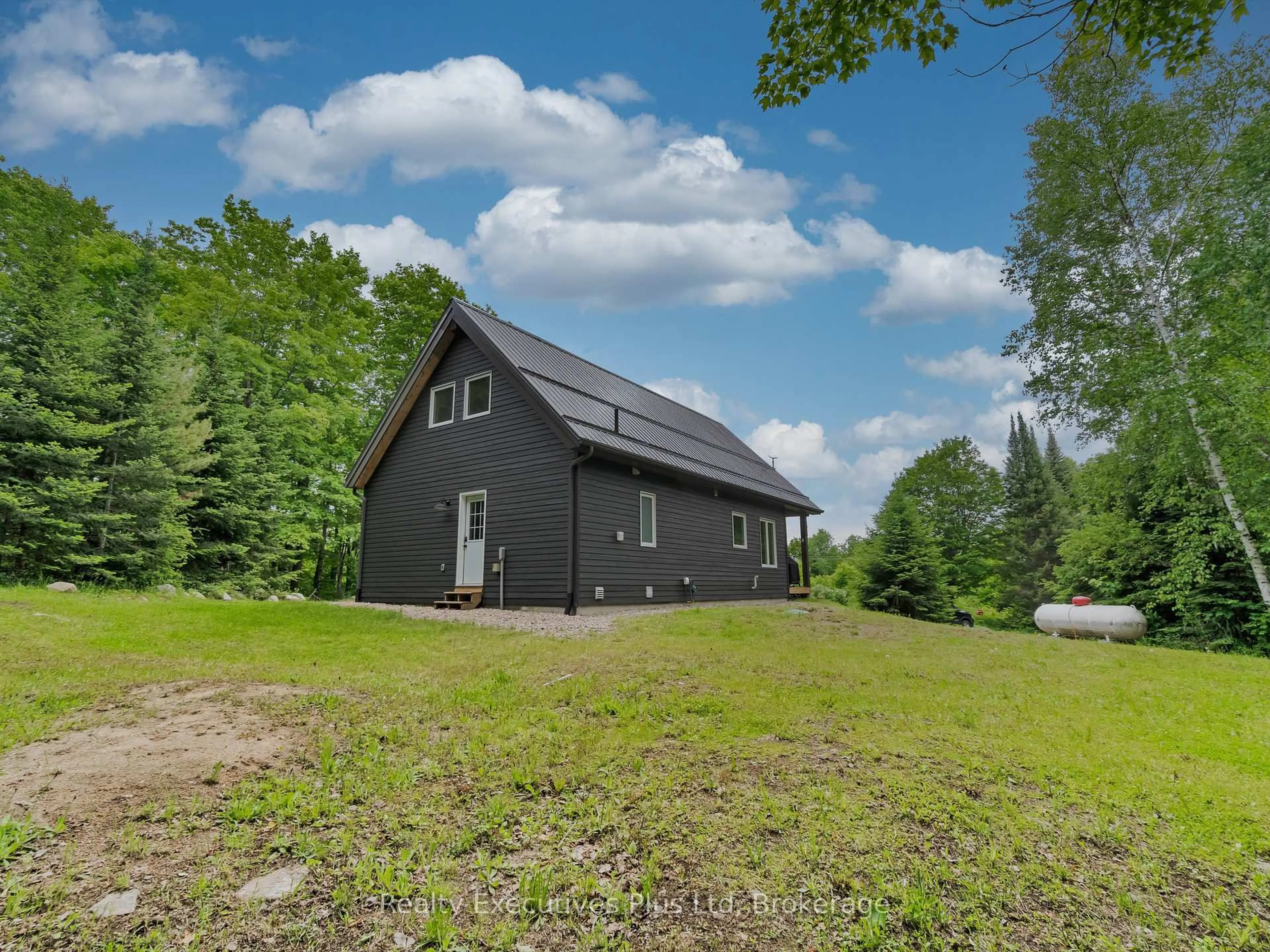 A pic from outside/outdoor area/front of a property/back of a property/a pic from drone, unknown for 1908 Eagle Lake Rd, Machar Ontario P0A 1X0