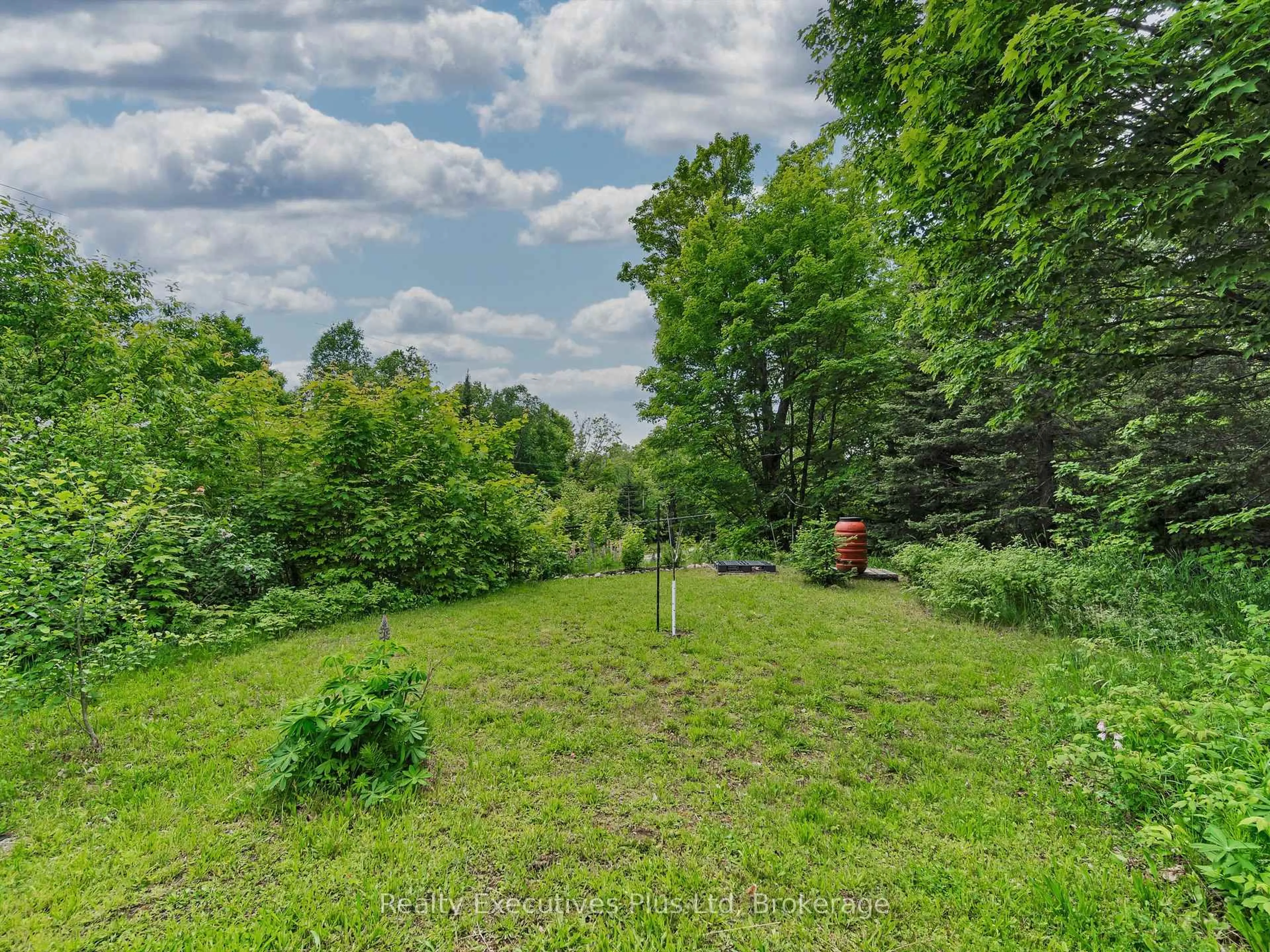 A pic from outside/outdoor area/front of a property/back of a property/a pic from drone, forest/trees view for 1908 Eagle Lake Rd, Machar Ontario P0A 1X0