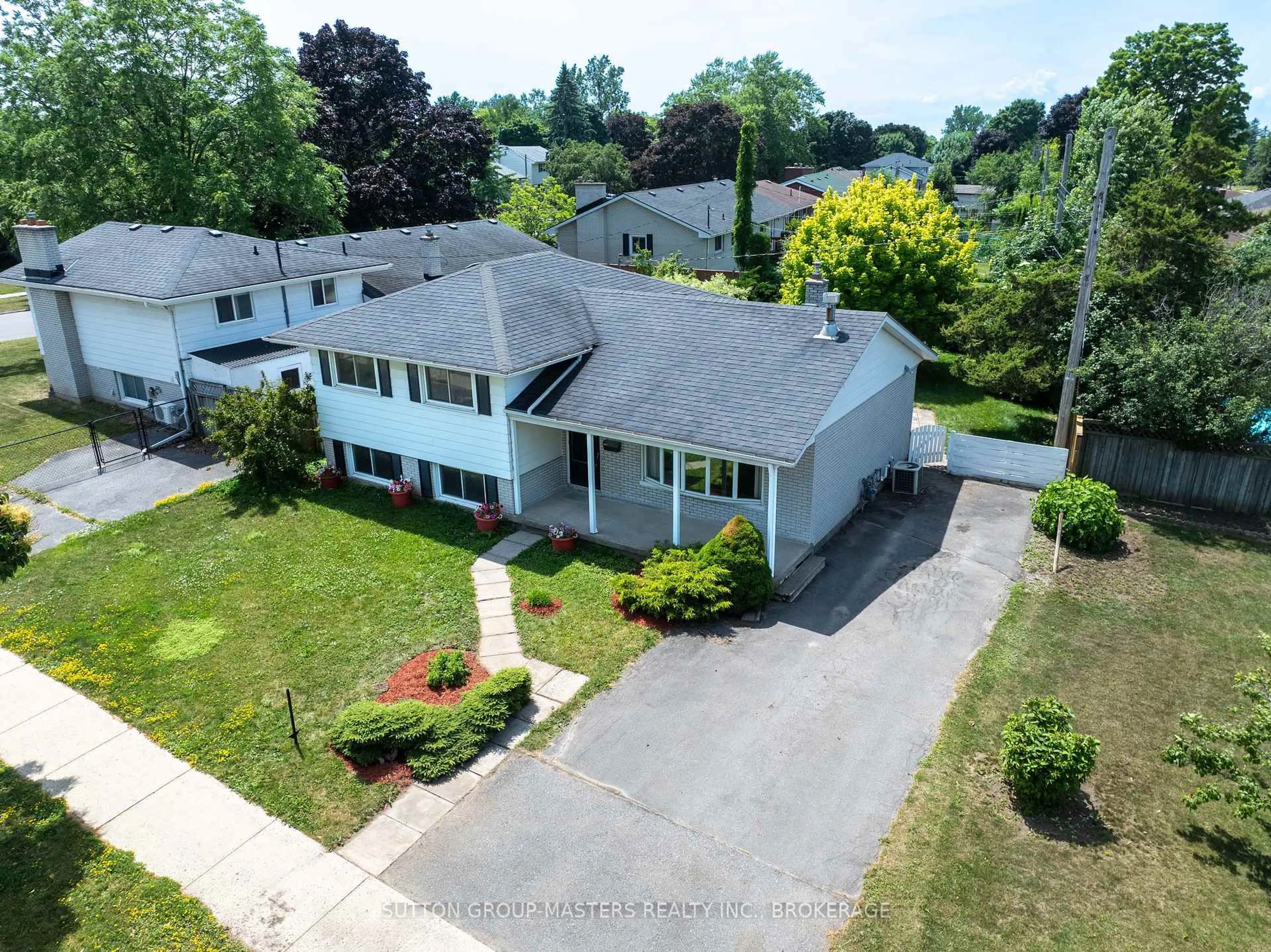 A pic from outside/outdoor area/front of a property/back of a property/a pic from drone, street for 344 Norman Rogers Dr, Kingston Ontario K7M 2R8