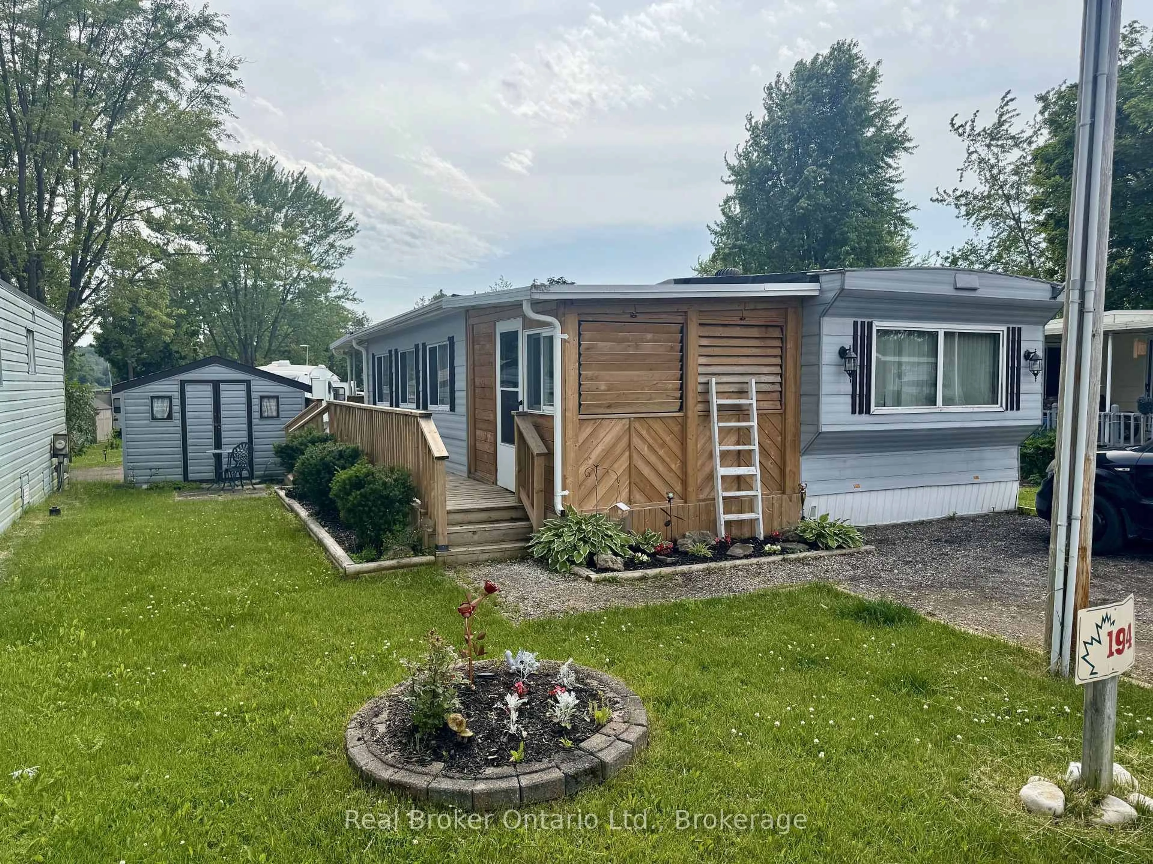 A pic from outside/outdoor area/front of a property/back of a property/a pic from drone, unknown for 580 Beaver Creek Rd #194, Waterloo Ontario N2J 3Z4