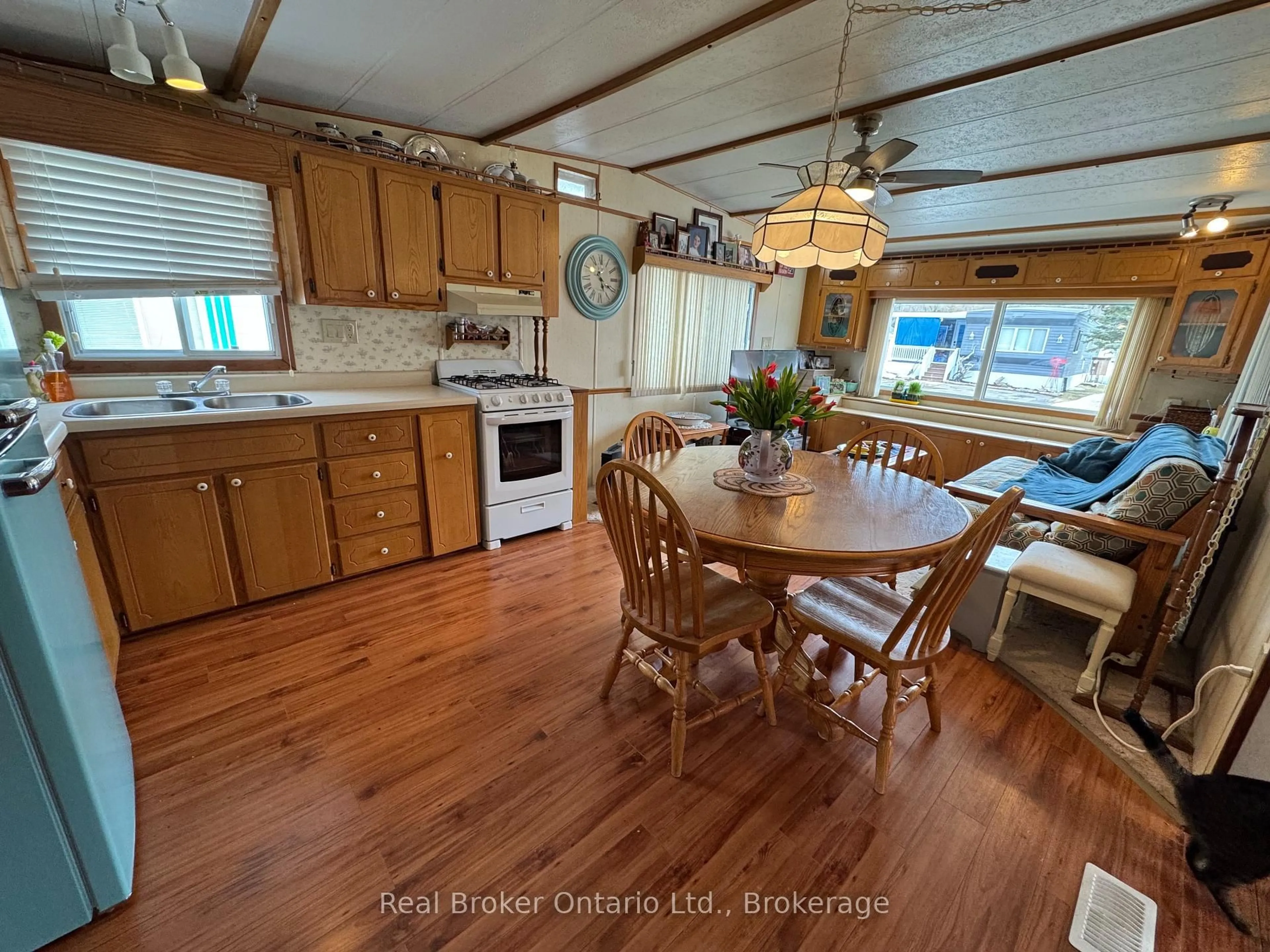 Open concept kitchen, wood/laminate floor for 580 Beaver Creek Rd #194, Waterloo Ontario N2J 3Z4