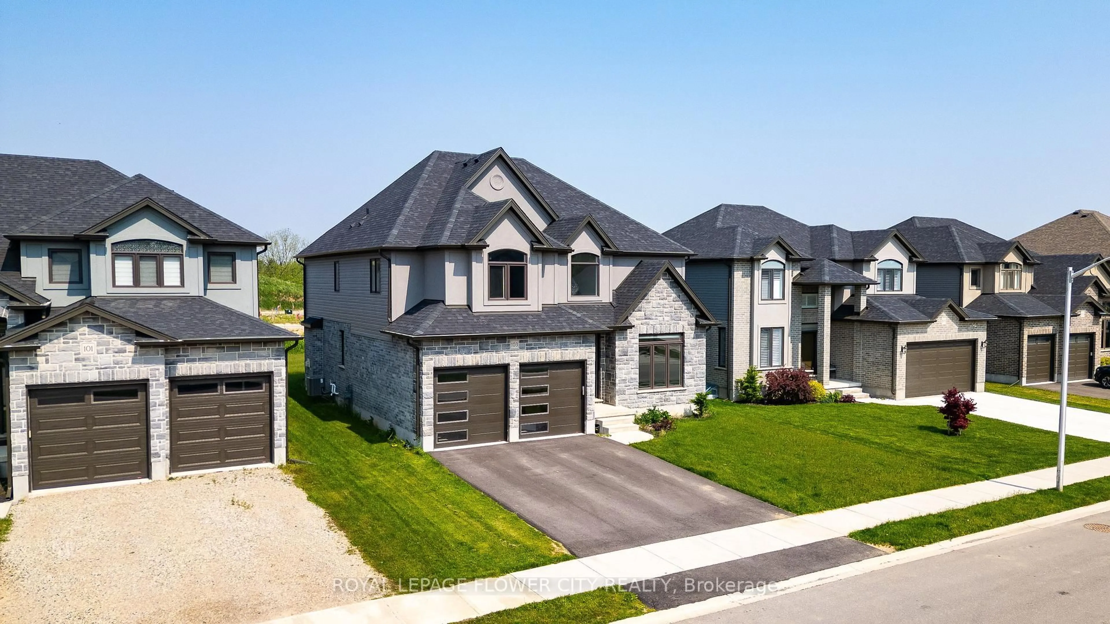 A pic from outside/outdoor area/front of a property/back of a property/a pic from drone, street for 103 Beech Blvd, Tillsonburg Ontario N4G 5S1